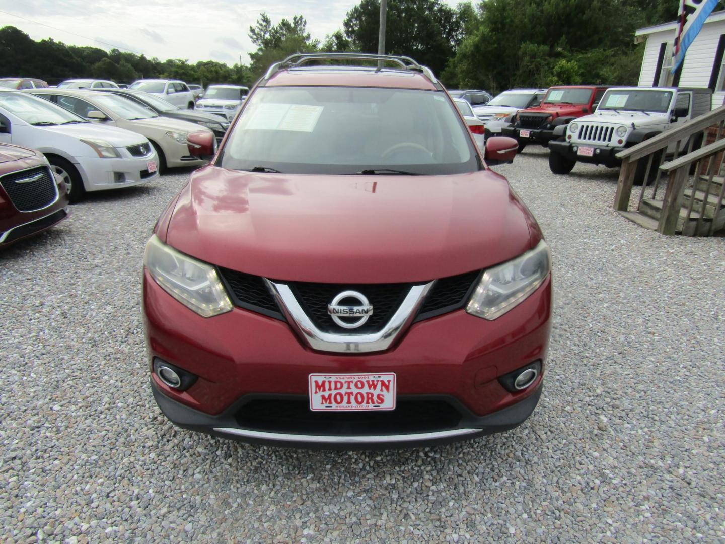 2014 Red Nissan Rogue S 2WD (5N1AT2MT8EC) with an 2.5L L4 DOHC 16V engine, Automatic transmission, located at 15016 S Hwy 231, Midland City, AL, 36350, (334) 983-3001, 31.306210, -85.495277 - Photo#1