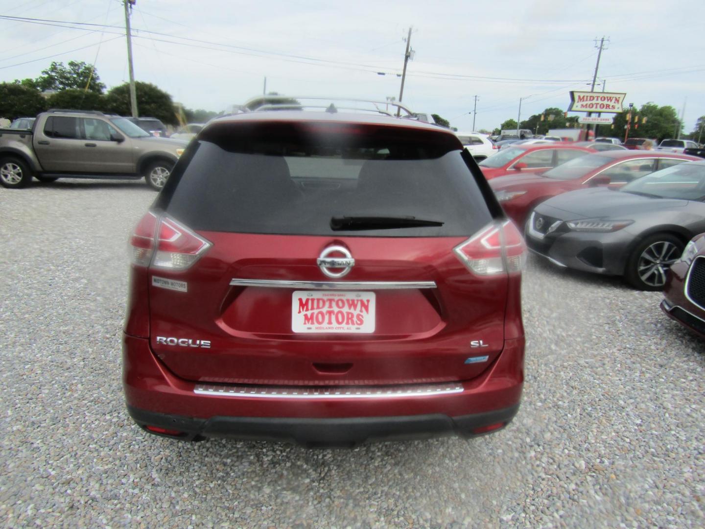 2014 Red Nissan Rogue S 2WD (5N1AT2MT8EC) with an 2.5L L4 DOHC 16V engine, Automatic transmission, located at 15016 S Hwy 231, Midland City, AL, 36350, (334) 983-3001, 31.306210, -85.495277 - Photo#5