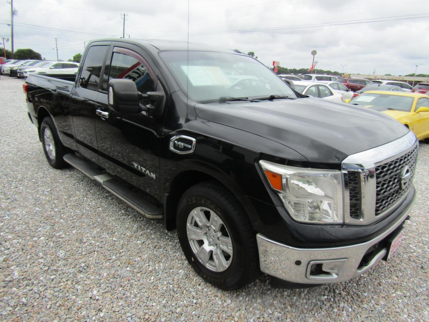 2017 Black Nissan Titan S King Cab 2WD (1N6AA1C62HN) with an 5.6L V8 DOHC 32V engine, Automatic transmission, located at 15016 S Hwy 231, Midland City, AL, 36350, (334) 983-3001, 31.306210, -85.495277 - Photo#0