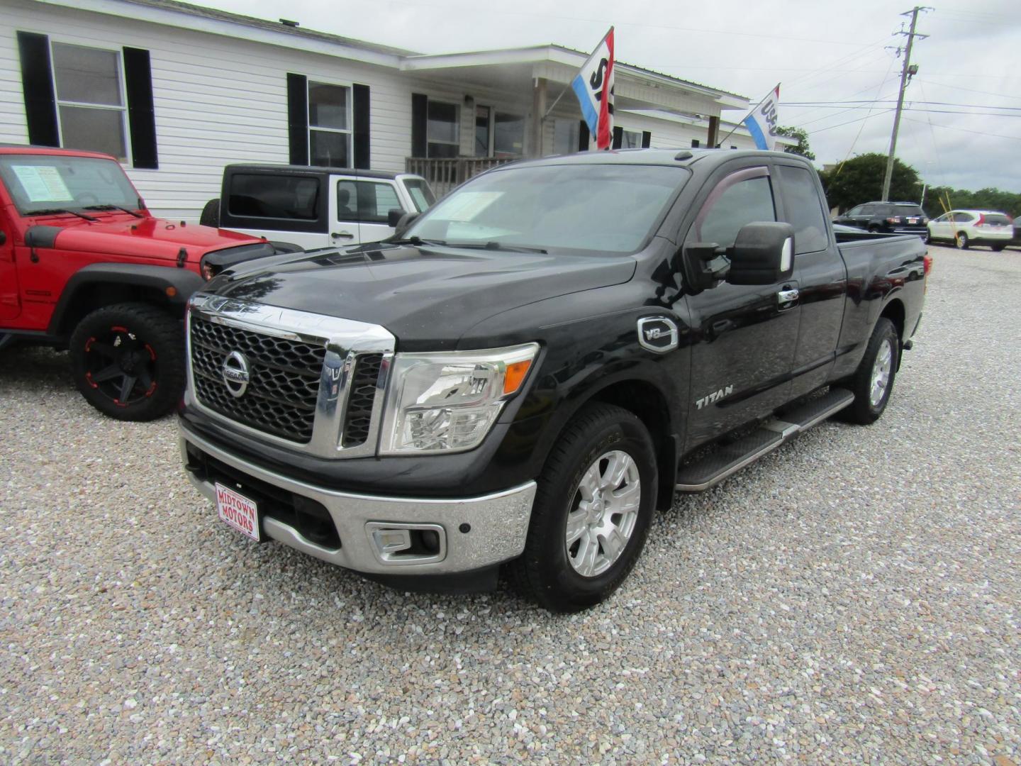 2017 Black Nissan Titan S King Cab 2WD (1N6AA1C62HN) with an 5.6L V8 DOHC 32V engine, Automatic transmission, located at 15016 S Hwy 231, Midland City, AL, 36350, (334) 983-3001, 31.306210, -85.495277 - Photo#2