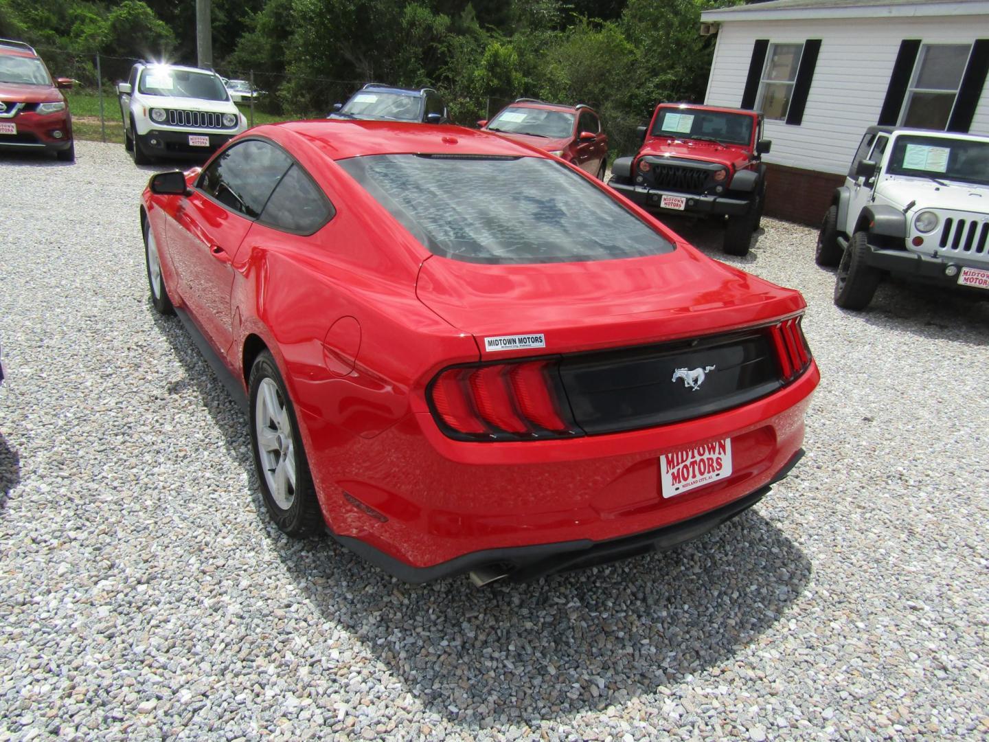 2019 Red Ford Mustang EcoBoost Coupe (1FA6P8TH7K5) with an 2.3L L4 DOHC 16V engine, Automatic transmission, located at 15016 S Hwy 231, Midland City, AL, 36350, (334) 983-3001, 31.306210, -85.495277 - Photo#4