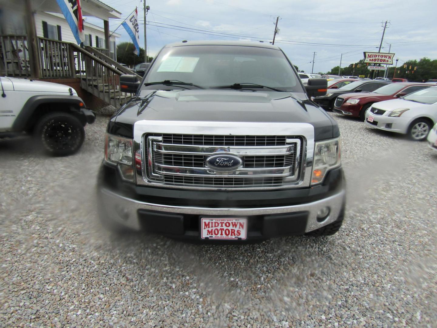 2014 DK GREEN Ford F-150 FX2 SuperCrew 5.5-ft. Bed 2WD (1FTFW1CFXEF) with an 5.0L V8 engine, Automatic transmission, located at 15016 S Hwy 231, Midland City, AL, 36350, (334) 983-3001, 31.306210, -85.495277 - Photo#1