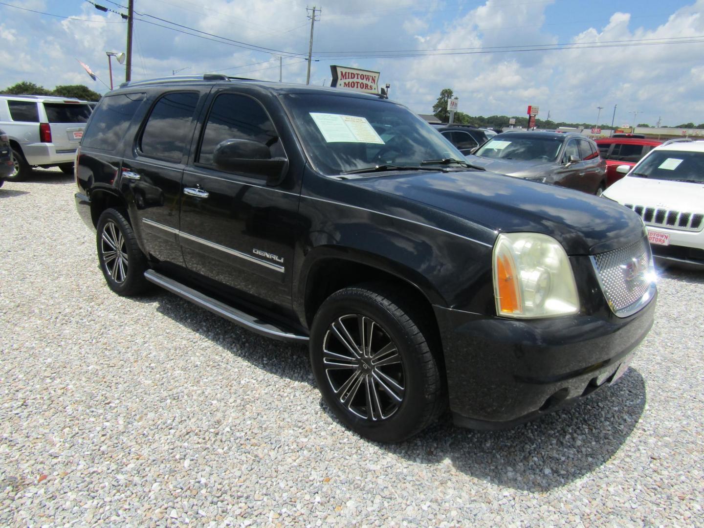 2012 Black GMC Yukon Denali 2WD (1GKS1EEFXCR) with an 6.2L V8 OHV 16V engine, Automatic transmission, located at 15016 S Hwy 231, Midland City, AL, 36350, (334) 983-3001, 31.306210, -85.495277 - Photo#0