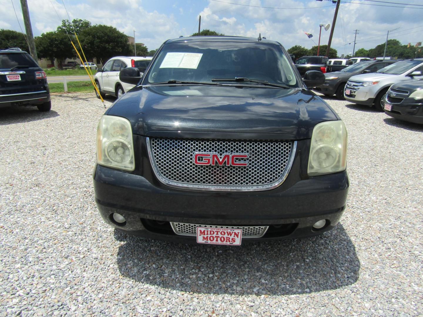 2012 Black GMC Yukon Denali 2WD (1GKS1EEFXCR) with an 6.2L V8 OHV 16V engine, Automatic transmission, located at 15016 S Hwy 231, Midland City, AL, 36350, (334) 983-3001, 31.306210, -85.495277 - Photo#1