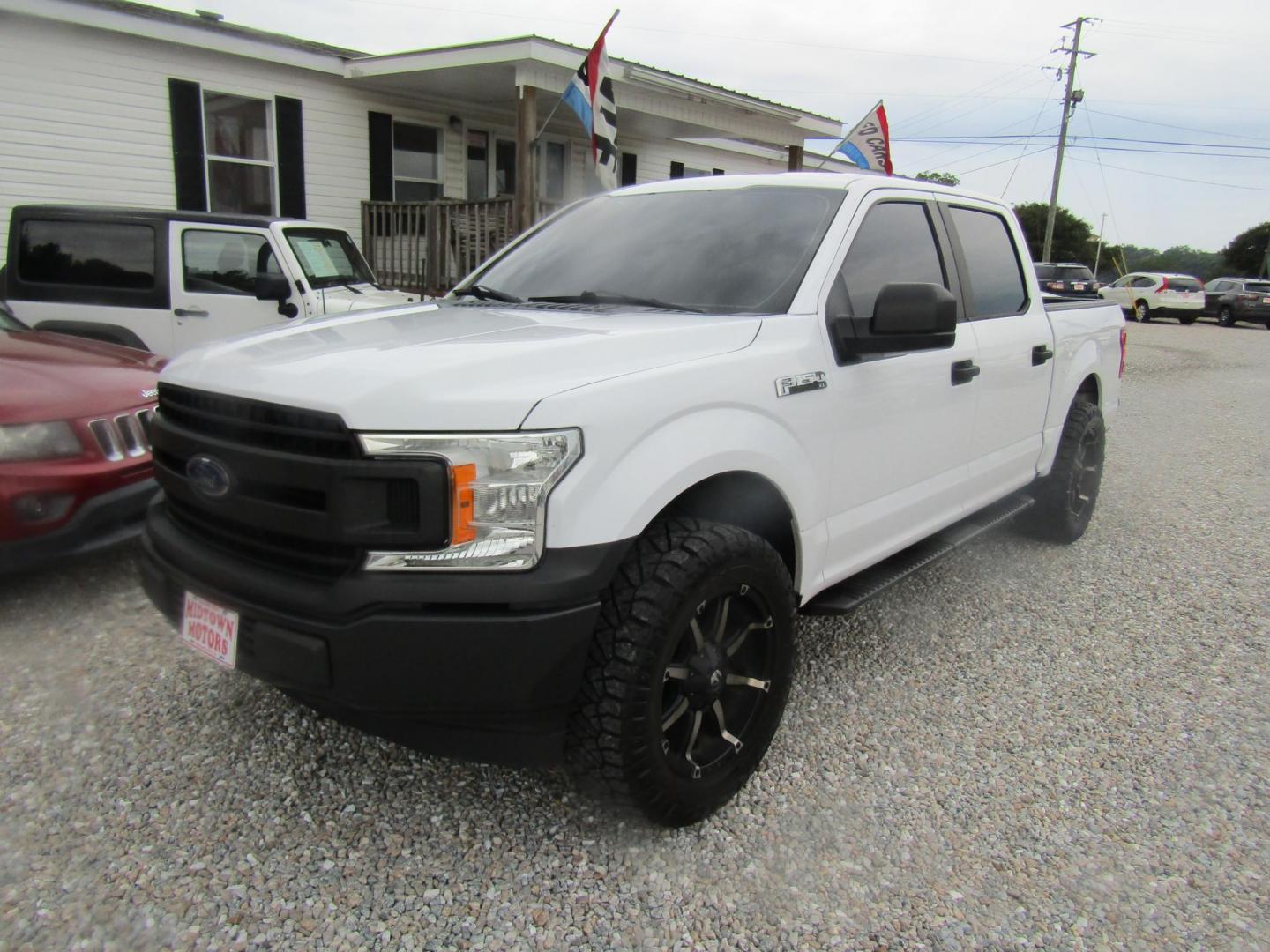 2018 White Ford F-150 King-Ranch SuperCrew 5.5-ft. 2WD (1FTEW1CB3JK) with an 3.3L V6 DOHC 24V engine, Automatic transmission, located at 15016 S Hwy 231, Midland City, AL, 36350, (334) 983-3001, 31.306210, -85.495277 - Photo#2