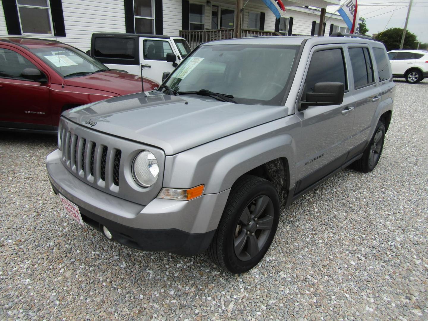 2016 Silver Jeep Patriot Sport 2WD (1C4NJPBA7GD) with an 2.0L L4 DOHC 16V engine, Automatic transmission, located at 15016 S Hwy 231, Midland City, AL, 36350, (334) 983-3001, 31.306210, -85.495277 - Photo#2