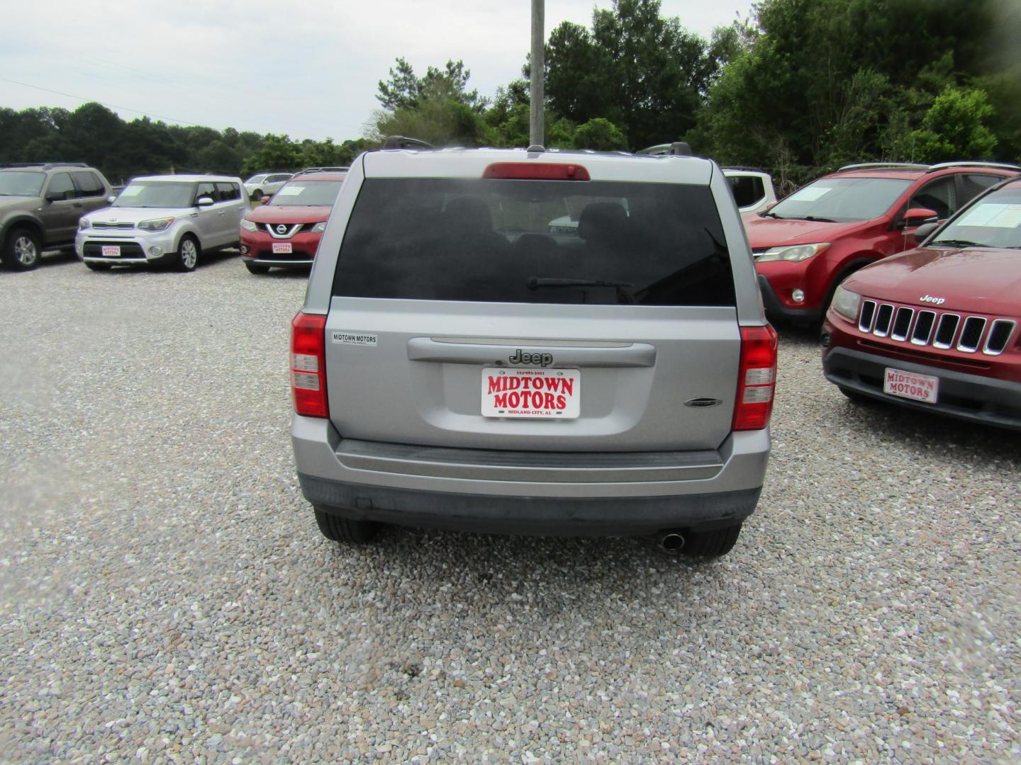 2016 Silver Jeep Patriot Sport 2WD (1C4NJPBA7GD) with an 2.0L L4 DOHC 16V engine, Automatic transmission, located at 15016 S Hwy 231, Midland City, AL, 36350, (334) 983-3001, 31.306210, -85.495277 - Photo#6