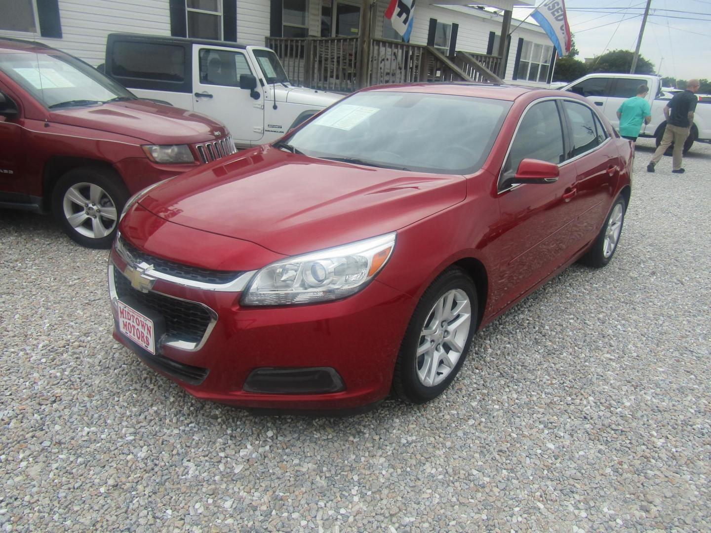 2014 Red Chevrolet Malibu 1LT (1G11C5SL0EF) with an 2.5L L4 DOHC 16V engine, Automatic transmission, located at 15016 S Hwy 231, Midland City, AL, 36350, (334) 983-3001, 31.306210, -85.495277 - Photo#1