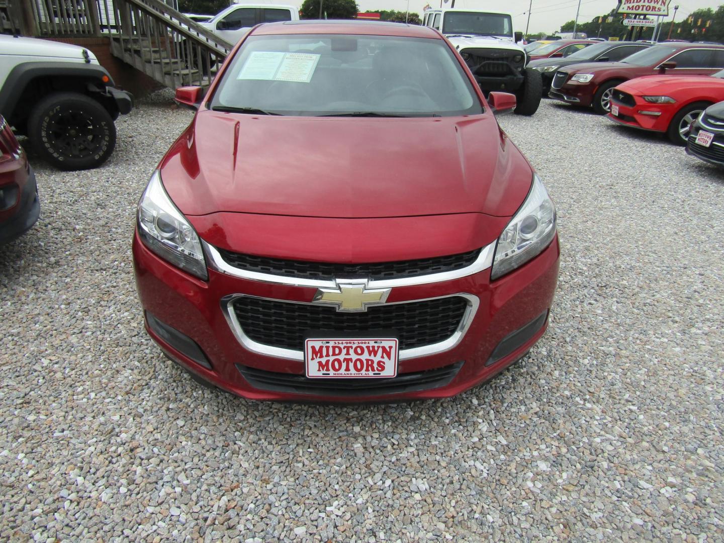 2014 Red Chevrolet Malibu 1LT (1G11C5SL0EF) with an 2.5L L4 DOHC 16V engine, Automatic transmission, located at 15016 S Hwy 231, Midland City, AL, 36350, (334) 983-3001, 31.306210, -85.495277 - Photo#0