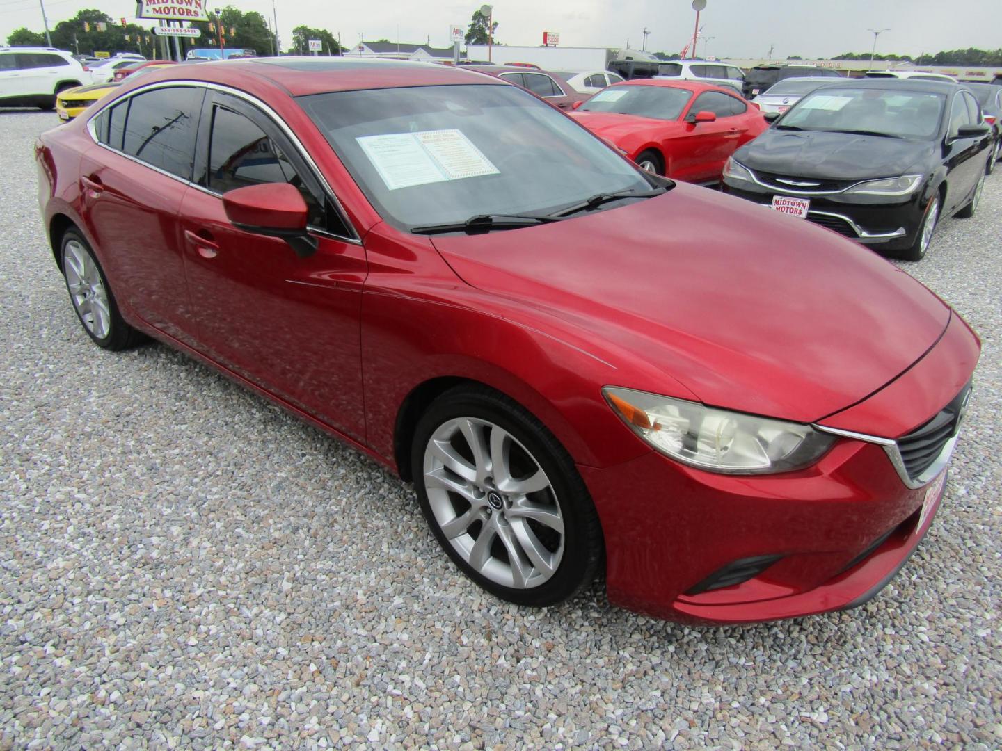 2017 Red Mazda Mazda6 i Touring AT (JM1GL1V51H1) with an 2.5L L4 DOHC 16V engine, Automatic transmission, located at 15016 S Hwy 231, Midland City, AL, 36350, (334) 983-3001, 31.306210, -85.495277 - Photo#0