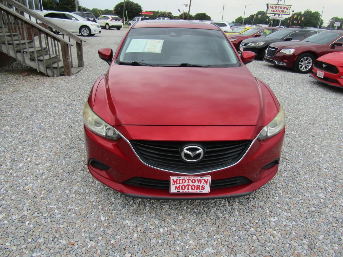 2017 Red Mazda Mazda6 i Touring AT (JM1GL1V51H1) with an 2.5L L4 DOHC 16V engine, Automatic transmission, located at 15016 S Hwy 231, Midland City, AL, 36350, (334) 983-3001, 31.306210, -85.495277 - Photo#1