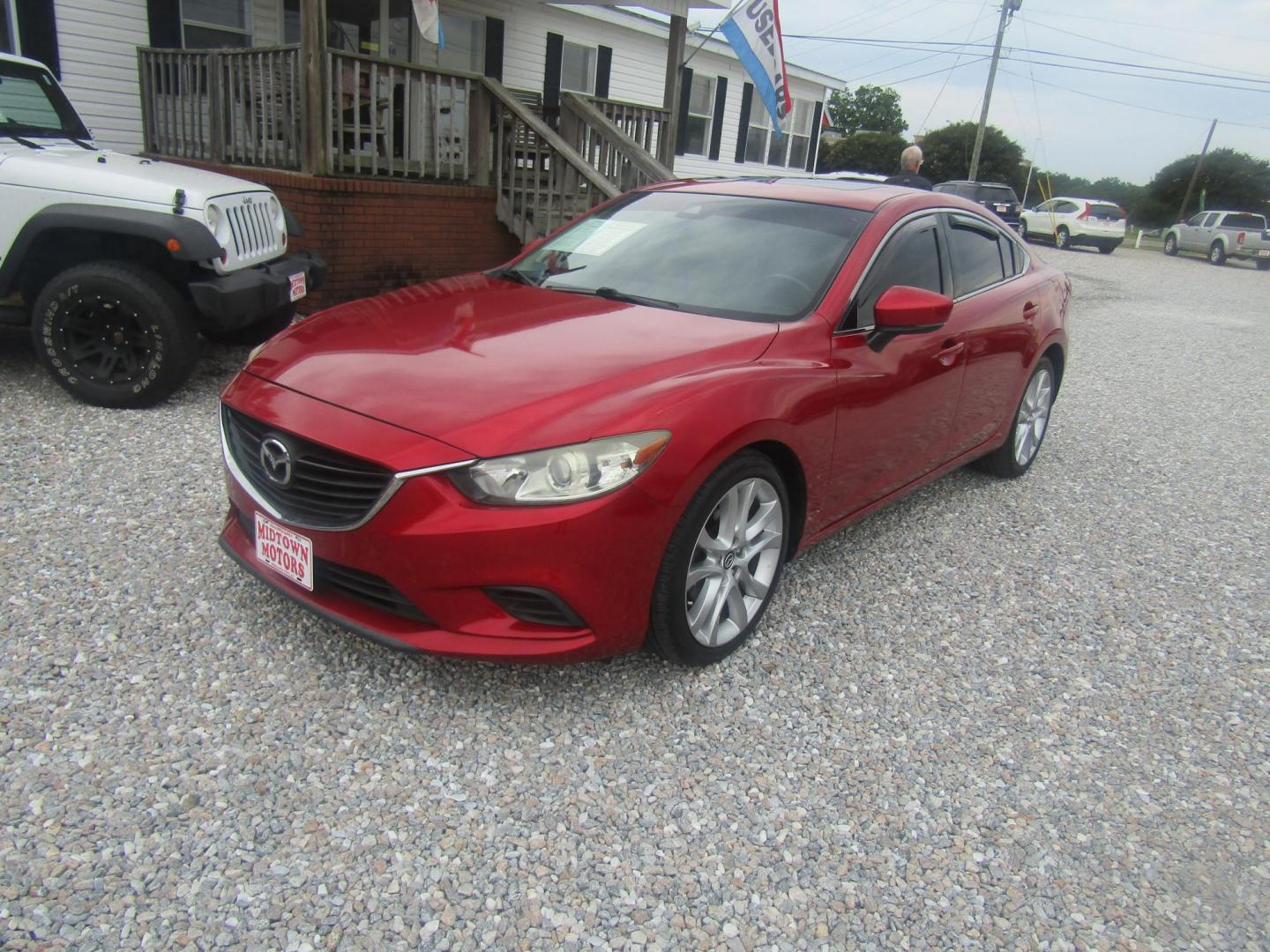 2017 Red Mazda Mazda6 i Touring AT (JM1GL1V51H1) with an 2.5L L4 DOHC 16V engine, Automatic transmission, located at 15016 S Hwy 231, Midland City, AL, 36350, (334) 983-3001, 31.306210, -85.495277 - Photo#2
