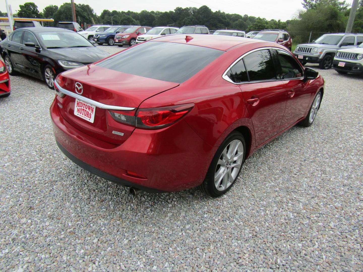 2017 Red Mazda Mazda6 i Touring AT (JM1GL1V51H1) with an 2.5L L4 DOHC 16V engine, Automatic transmission, located at 15016 S Hwy 231, Midland City, AL, 36350, (334) 983-3001, 31.306210, -85.495277 - Photo#5