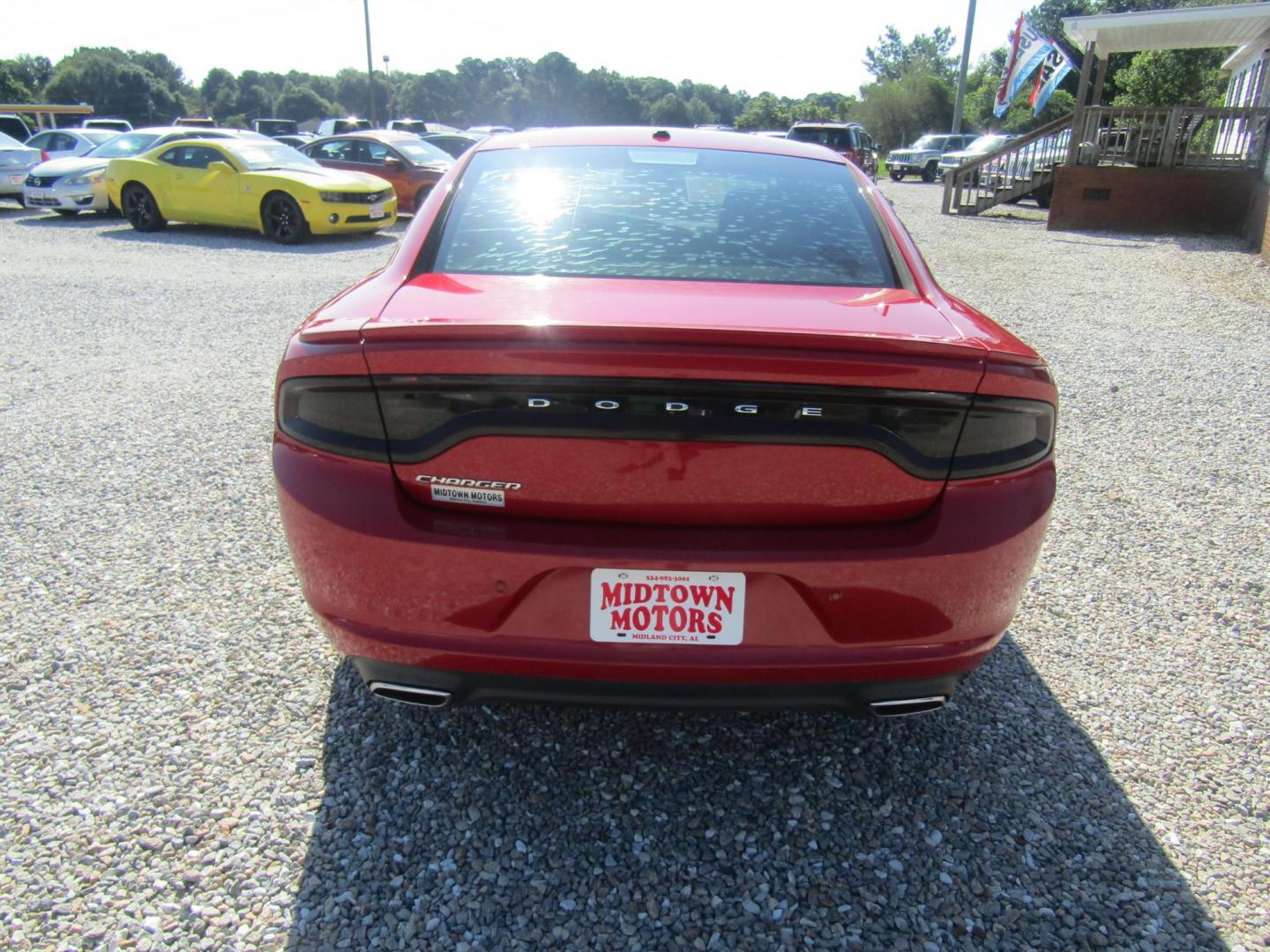 2015 Red Dodge Charger SE (2C3CDXBG8FH) with an 3.6L V6 DOHC 24V engine, Automatic transmission, located at 15016 S Hwy 231, Midland City, AL, 36350, (334) 983-3001, 31.306210, -85.495277 - Photo#6