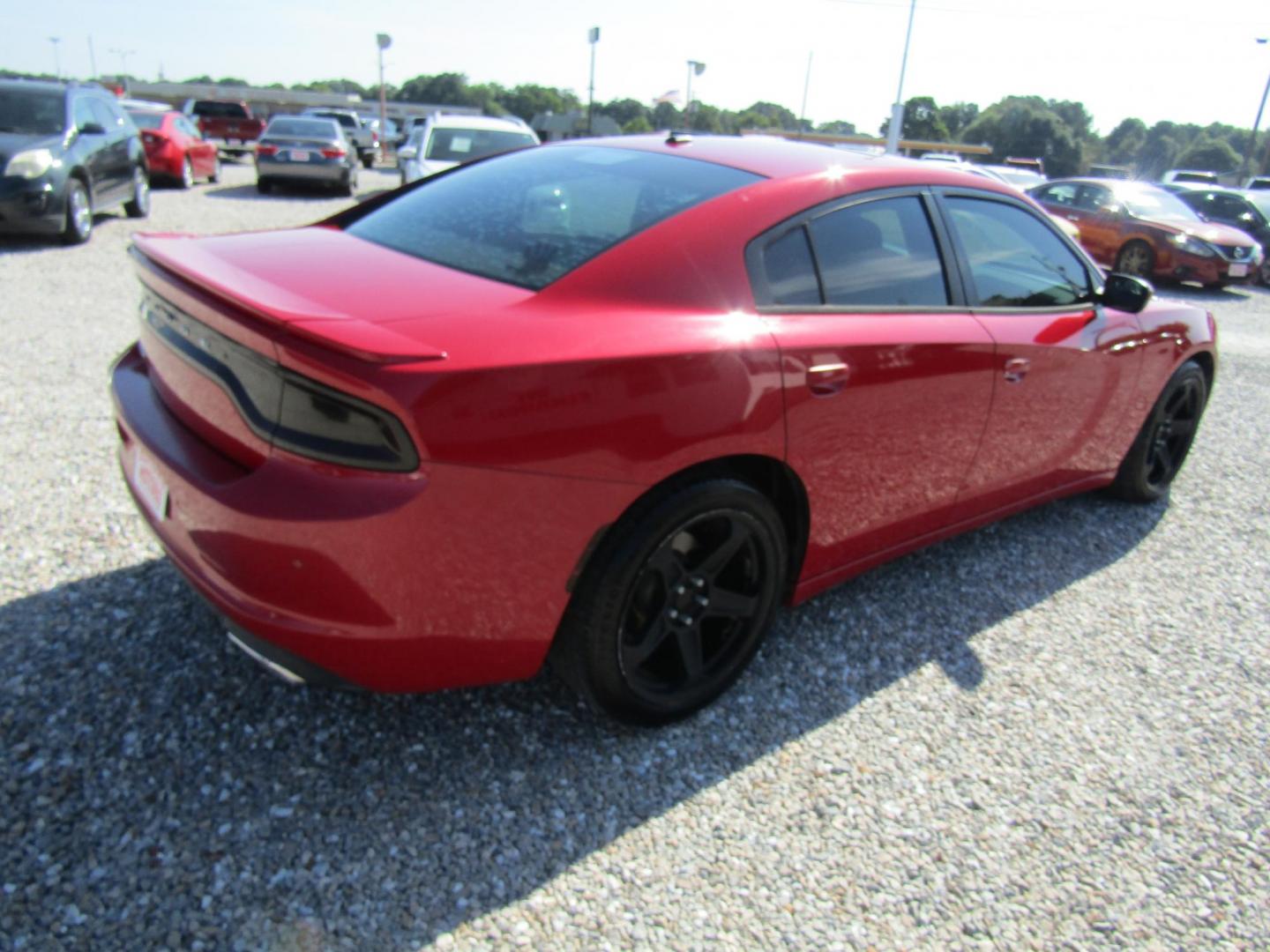 2015 Red Dodge Charger SE (2C3CDXBG8FH) with an 3.6L V6 DOHC 24V engine, Automatic transmission, located at 15016 S Hwy 231, Midland City, AL, 36350, (334) 983-3001, 31.306210, -85.495277 - Photo#7