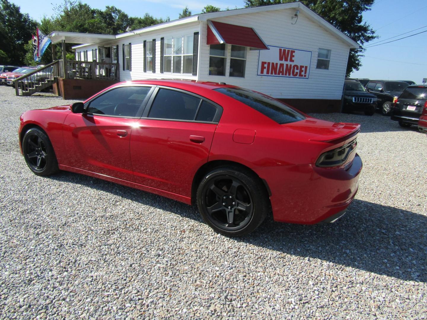 2015 Red Dodge Charger SE (2C3CDXBG8FH) with an 3.6L V6 DOHC 24V engine, Automatic transmission, located at 15016 S Hwy 231, Midland City, AL, 36350, (334) 983-3001, 31.306210, -85.495277 - Photo#5
