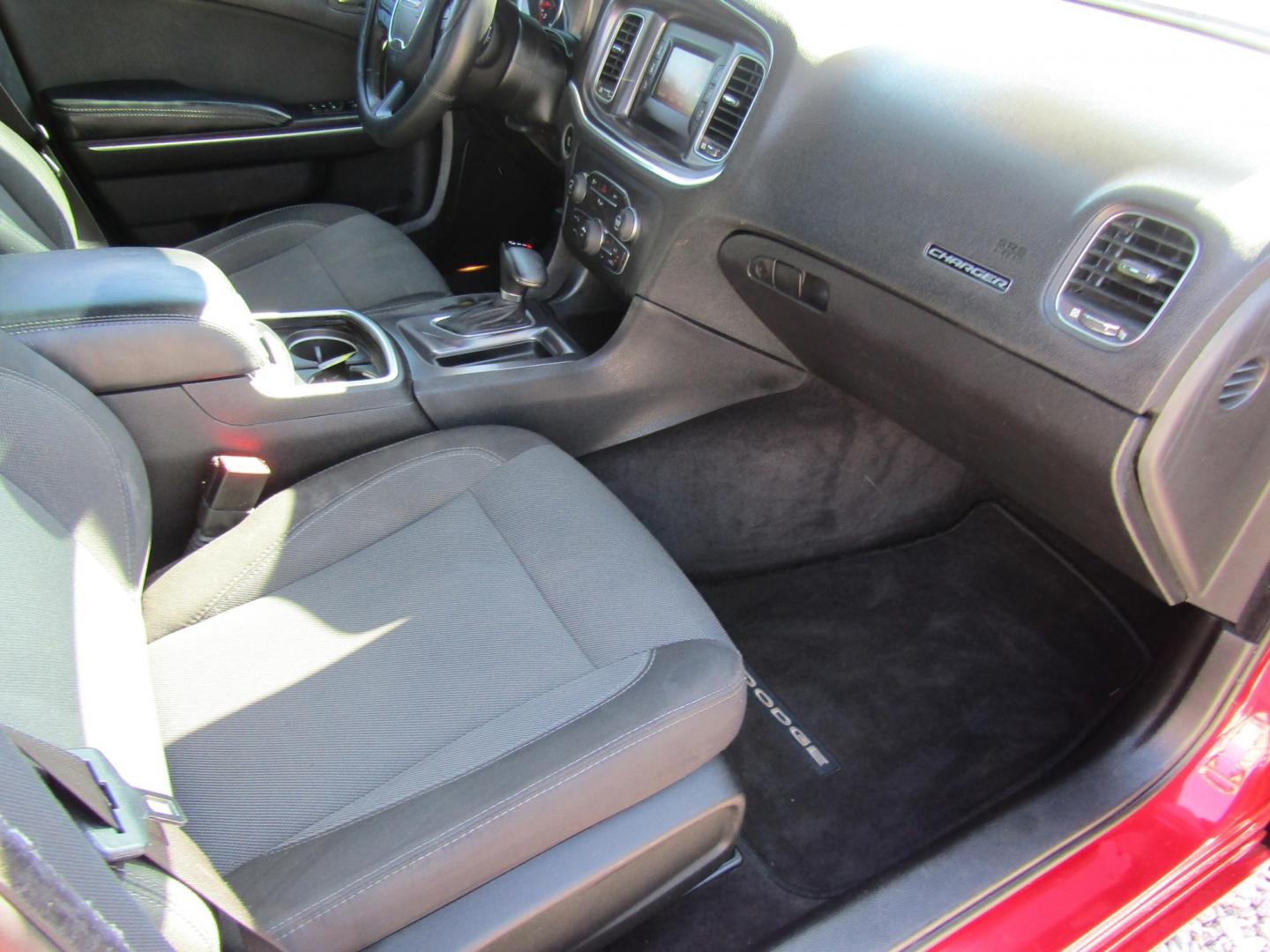 2015 Red Dodge Charger SE (2C3CDXBG8FH) with an 3.6L V6 DOHC 24V engine, Automatic transmission, located at 15016 S Hwy 231, Midland City, AL, 36350, (334) 983-3001, 31.306210, -85.495277 - Photo#9