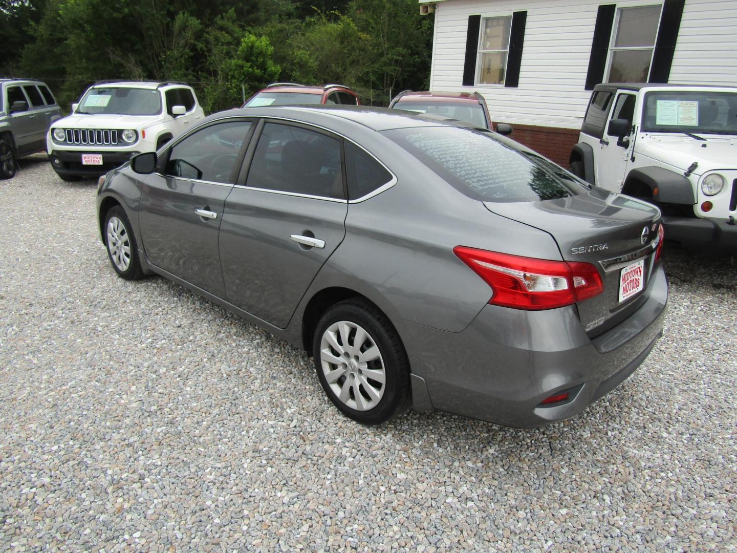 2017 Gray Nissan Sentra S 6MT (3N1AB7AP0HY) with an 1.8L L4 SFI DOHC 16V engine, Automatic transmission, located at 15016 S Hwy 231, Midland City, AL, 36350, (334) 983-3001, 31.306210, -85.495277 - Photo#2