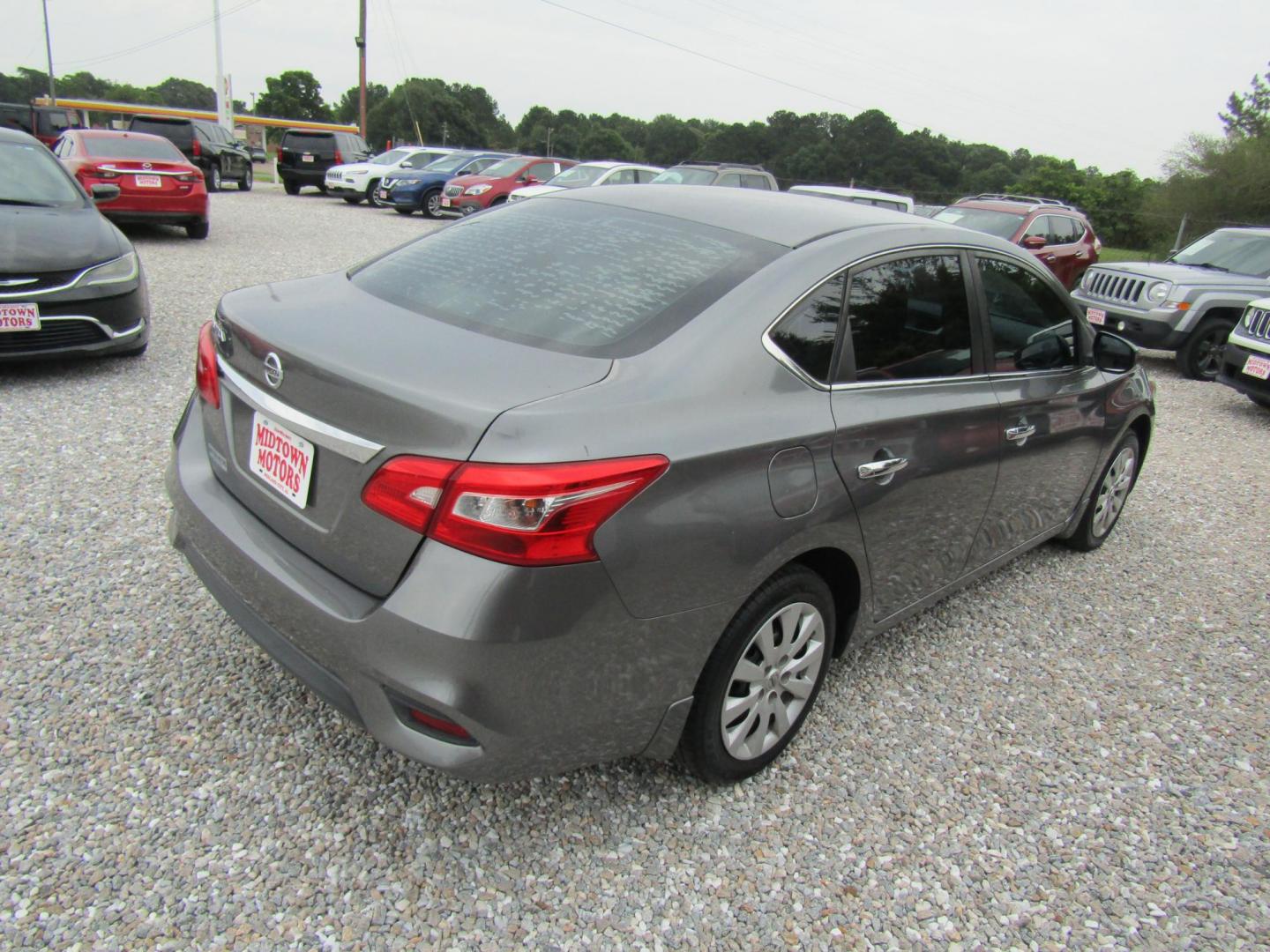 2017 Gray Nissan Sentra S 6MT (3N1AB7AP0HY) with an 1.8L L4 SFI DOHC 16V engine, Automatic transmission, located at 15016 S Hwy 231, Midland City, AL, 36350, (334) 983-3001, 31.306210, -85.495277 - Photo#4