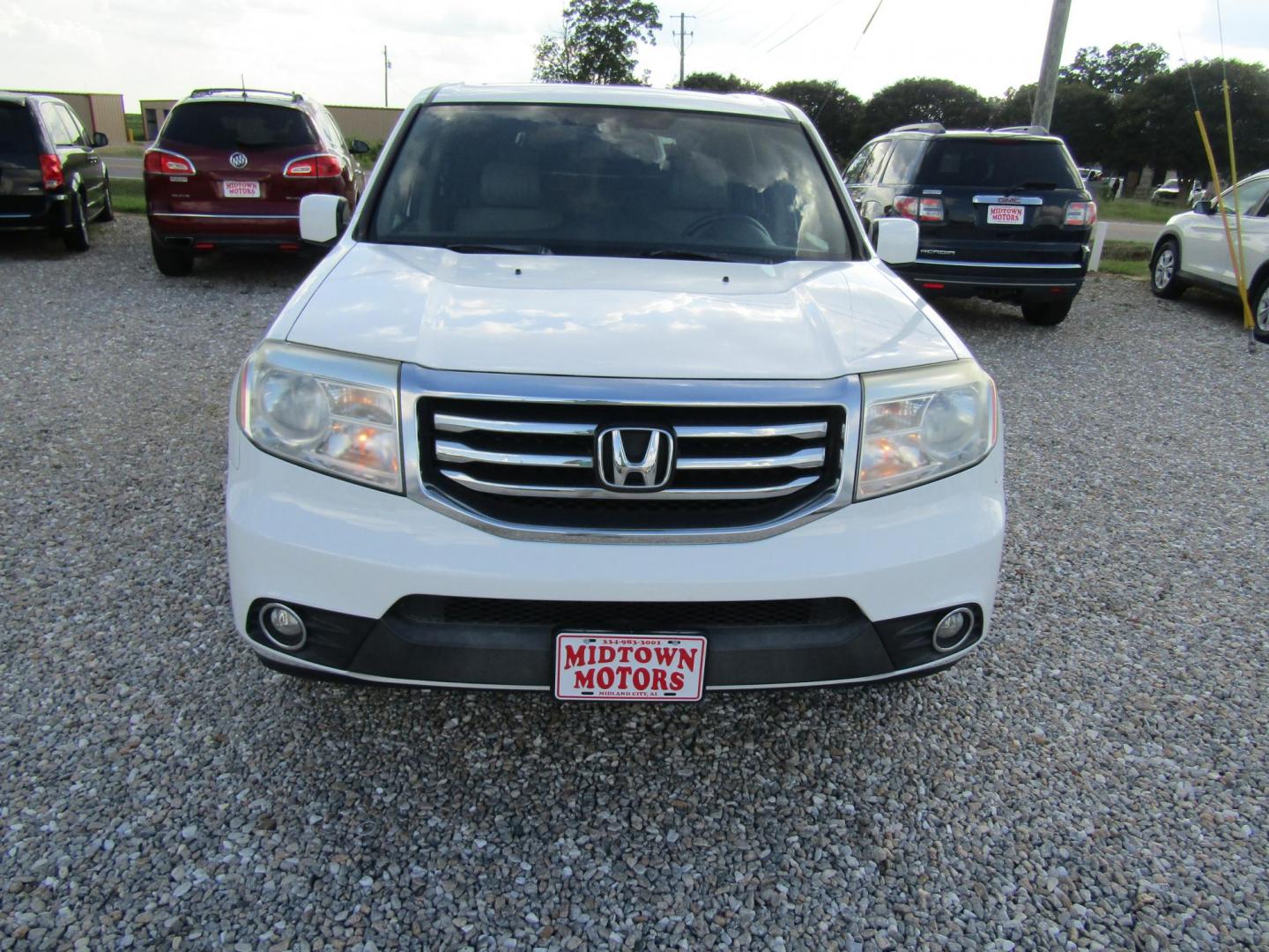 2015 White Honda Pilot EX-L 2WD 5-Spd AT (5FNYF3H53FB) with an 3.5L V6 SOHC 24V engine, Automatic transmission, located at 15016 S Hwy 231, Midland City, AL, 36350, (334) 983-3001, 31.306210, -85.495277 - Photo#1