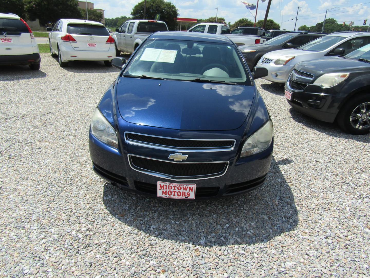 2010 Blue Chevrolet Malibu LS (1G1ZB5EBXAF) with an 2.4L L4 DOHC 16V engine, Automatic transmission, located at 15016 S Hwy 231, Midland City, AL, 36350, (334) 983-3001, 31.306210, -85.495277 - Photo#1