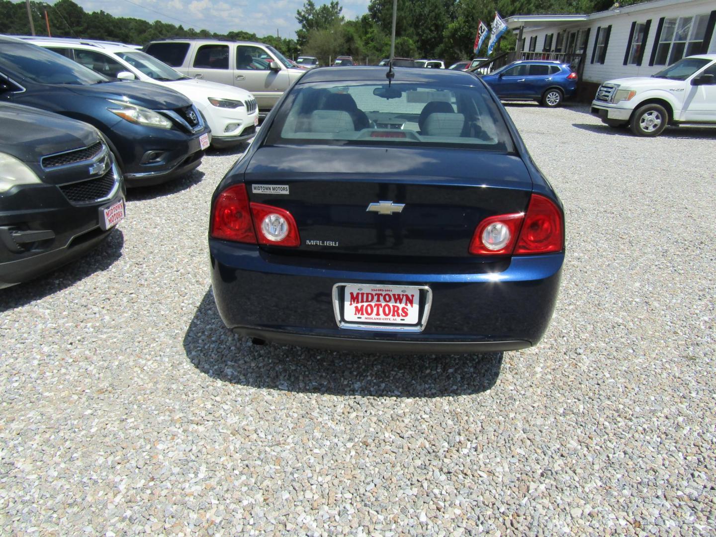 2010 Blue Chevrolet Malibu LS (1G1ZB5EBXAF) with an 2.4L L4 DOHC 16V engine, Automatic transmission, located at 15016 S Hwy 231, Midland City, AL, 36350, (334) 983-3001, 31.306210, -85.495277 - Photo#5
