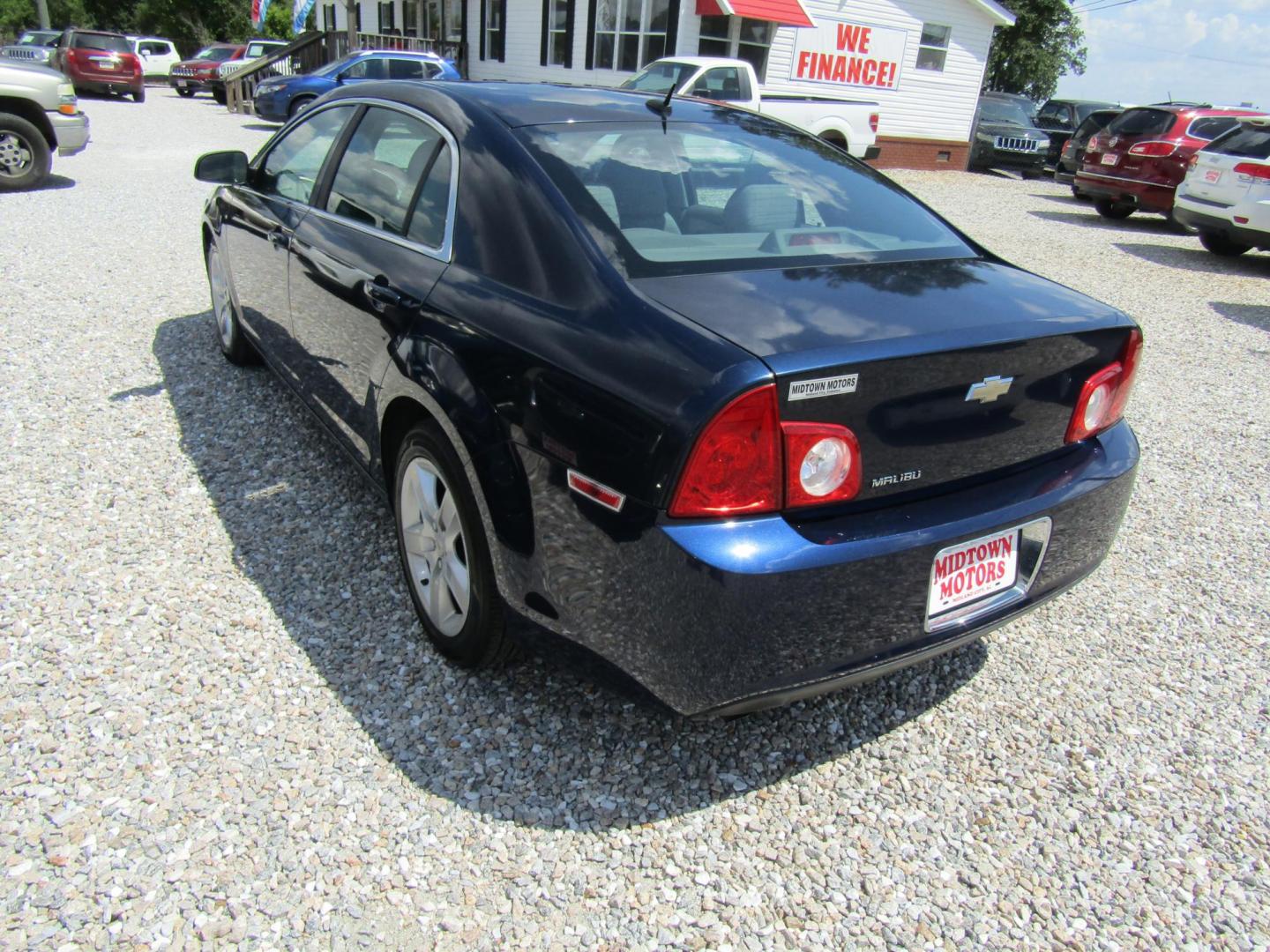 2010 Blue Chevrolet Malibu LS (1G1ZB5EBXAF) with an 2.4L L4 DOHC 16V engine, Automatic transmission, located at 15016 S Hwy 231, Midland City, AL, 36350, (334) 983-3001, 31.306210, -85.495277 - Photo#4