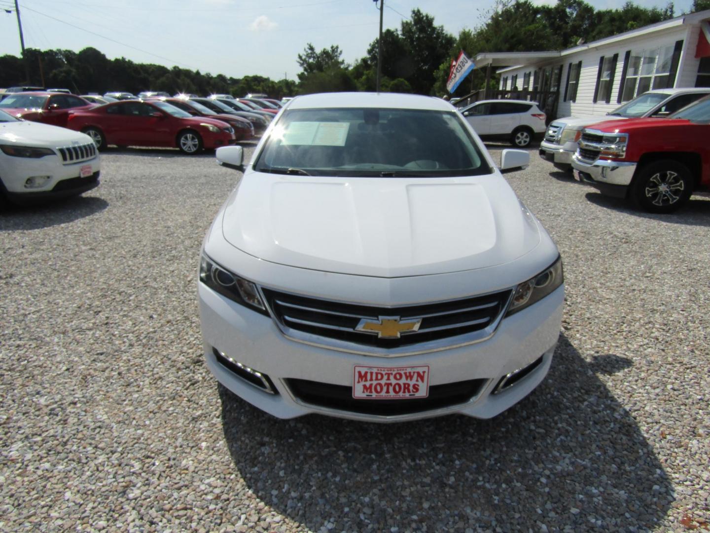 2018 White Chevrolet Impala LT (2G1105S36J9) with an 3.6L V6 DOHC 24V engine, Automatic transmission, located at 15016 S Hwy 231, Midland City, AL, 36350, (334) 983-3001, 31.306210, -85.495277 - Photo#1
