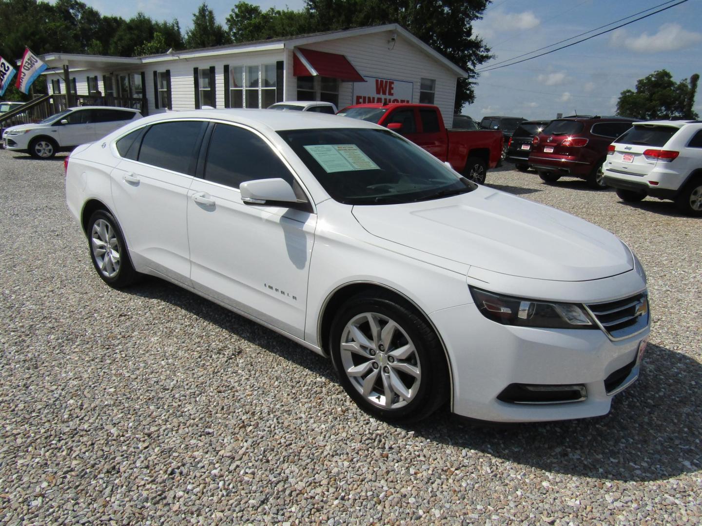 2018 White Chevrolet Impala LT (2G1105S36J9) with an 3.6L V6 DOHC 24V engine, Automatic transmission, located at 15016 S Hwy 231, Midland City, AL, 36350, (334) 983-3001, 31.306210, -85.495277 - Photo#0