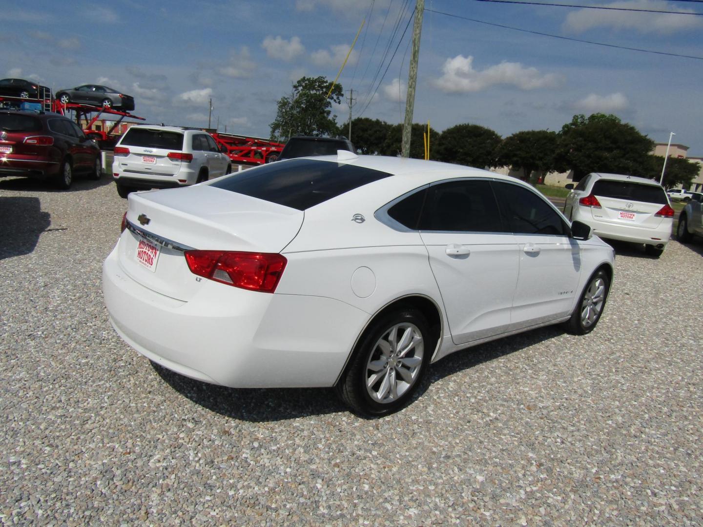 2018 White Chevrolet Impala LT (2G1105S36J9) with an 3.6L V6 DOHC 24V engine, Automatic transmission, located at 15016 S Hwy 231, Midland City, AL, 36350, (334) 983-3001, 31.306210, -85.495277 - Photo#6