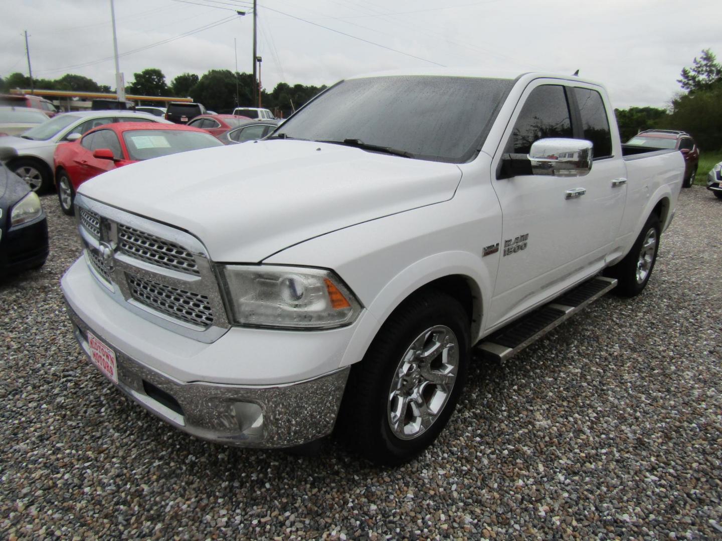 2017 White RAM 1500 Laramie Quad Cab 2WD (1C6RR6JT0HS) with an 5.7L V8 OHV 16V engine, Automatic transmission, located at 15016 S Hwy 231, Midland City, AL, 36350, (334) 983-3001, 31.306210, -85.495277 - Photo#2