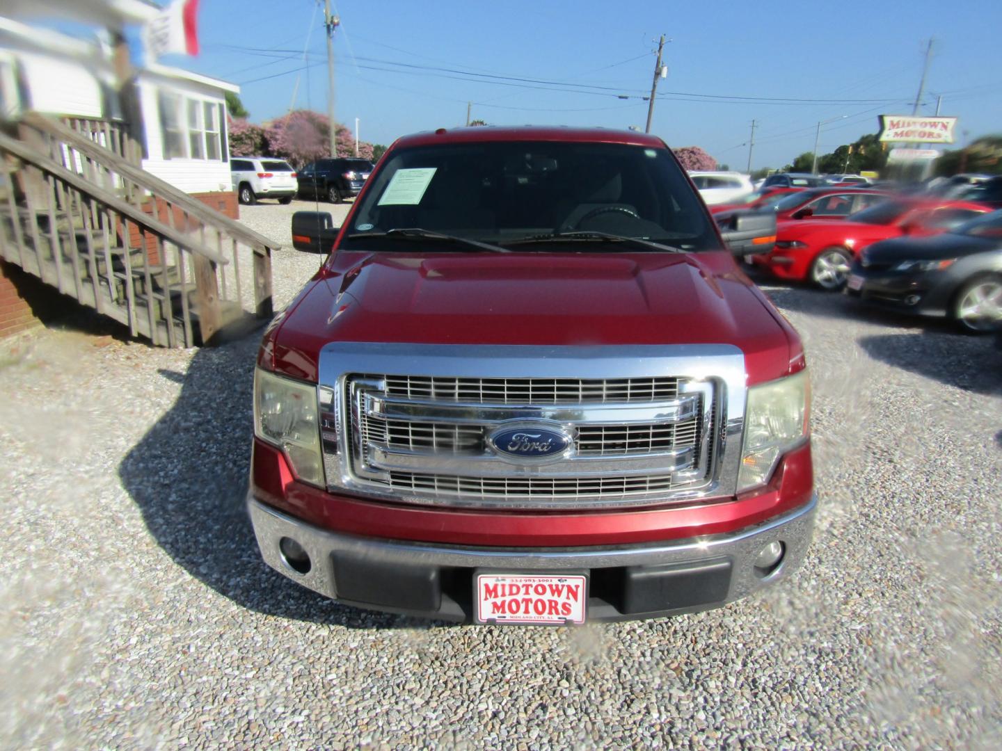 2014 Red Ford F-150 FX2 SuperCrew 5.5-ft. Bed 2WD (1FTFW1CF4EK) with an 5.0L V8 engine, Automatic transmission, located at 15016 S Hwy 231, Midland City, AL, 36350, (334) 983-3001, 31.306210, -85.495277- Photo#1