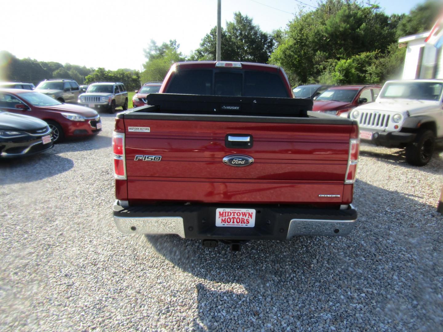 2014 Red Ford F-150 FX2 SuperCrew 5.5-ft. Bed 2WD (1FTFW1CF4EK) with an 5.0L V8 engine, Automatic transmission, located at 15016 S Hwy 231, Midland City, AL, 36350, (334) 983-3001, 31.306210, -85.495277- Photo#6