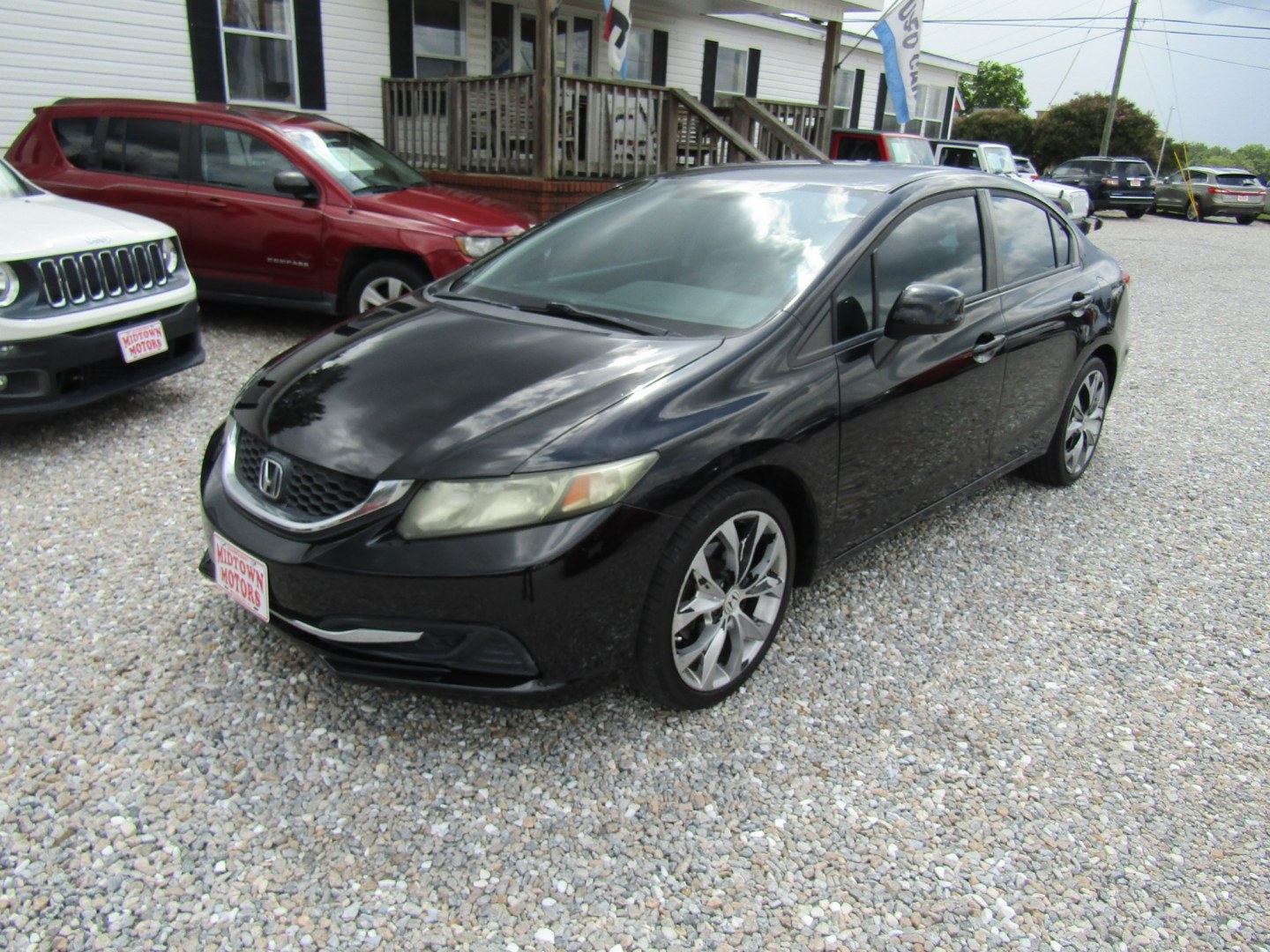 2013 Black Honda Civic LX Sedan 5-Speed AT (19XFB2F51DE) with an 1.8L L4 SOHC 16V engine, Automatic transmission, located at 15016 S Hwy 231, Midland City, AL, 36350, (334) 983-3001, 31.306210, -85.495277- Photo#2