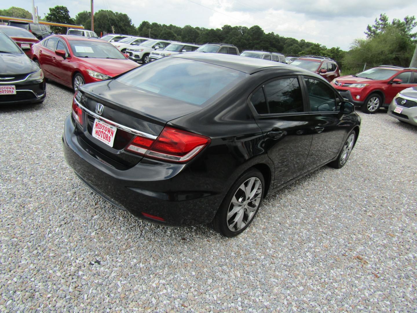 2013 Black Honda Civic LX Sedan 5-Speed AT (19XFB2F51DE) with an 1.8L L4 SOHC 16V engine, Automatic transmission, located at 15016 S Hwy 231, Midland City, AL, 36350, (334) 983-3001, 31.306210, -85.495277- Photo#6