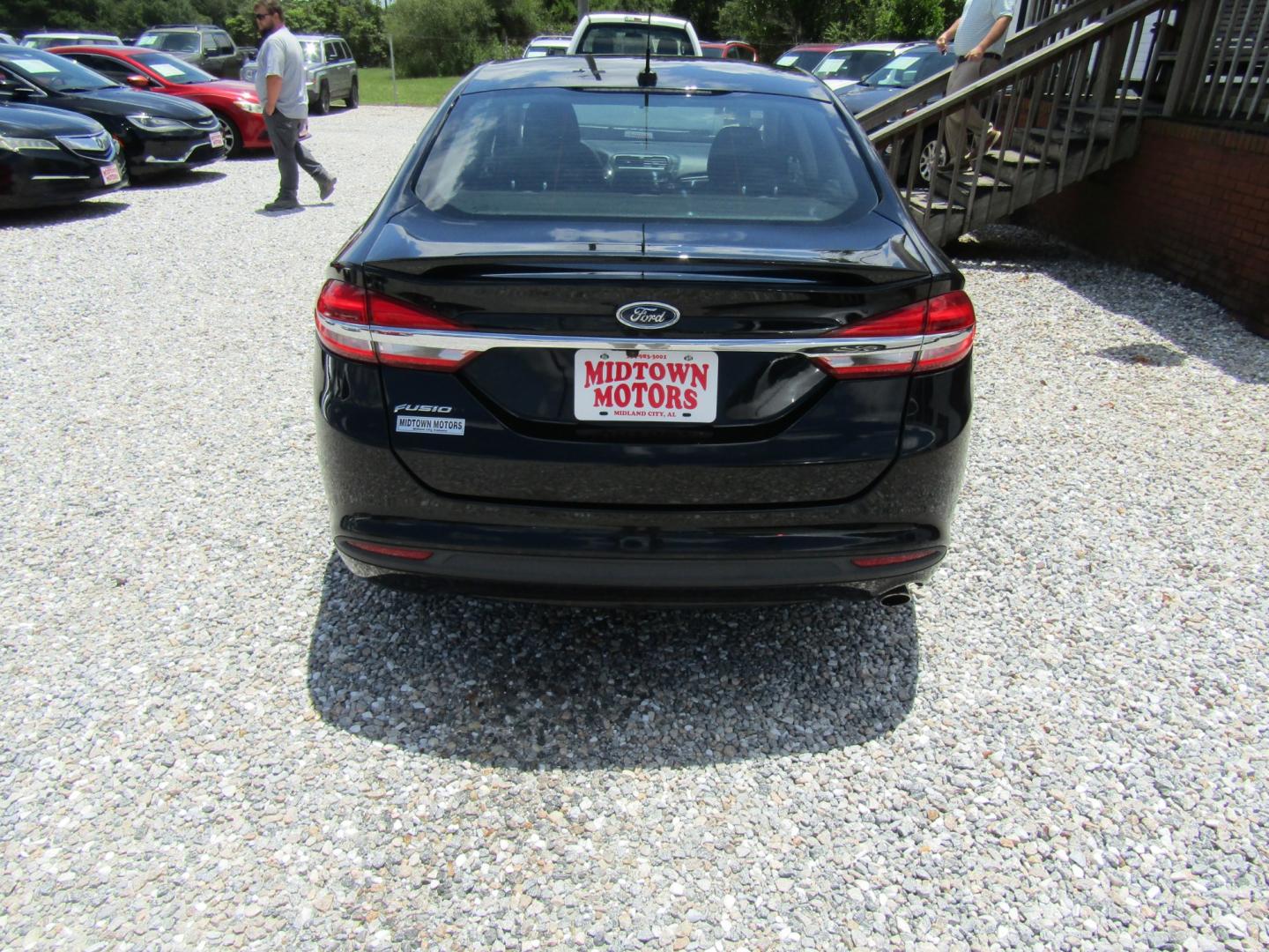 2018 Black Ford Fusion S (3FA6P0G70JR) with an 2.5L L4 DOHC 16V engine, Automatic transmission, located at 15016 S Hwy 231, Midland City, AL, 36350, (334) 983-3001, 31.306210, -85.495277- Photo#6