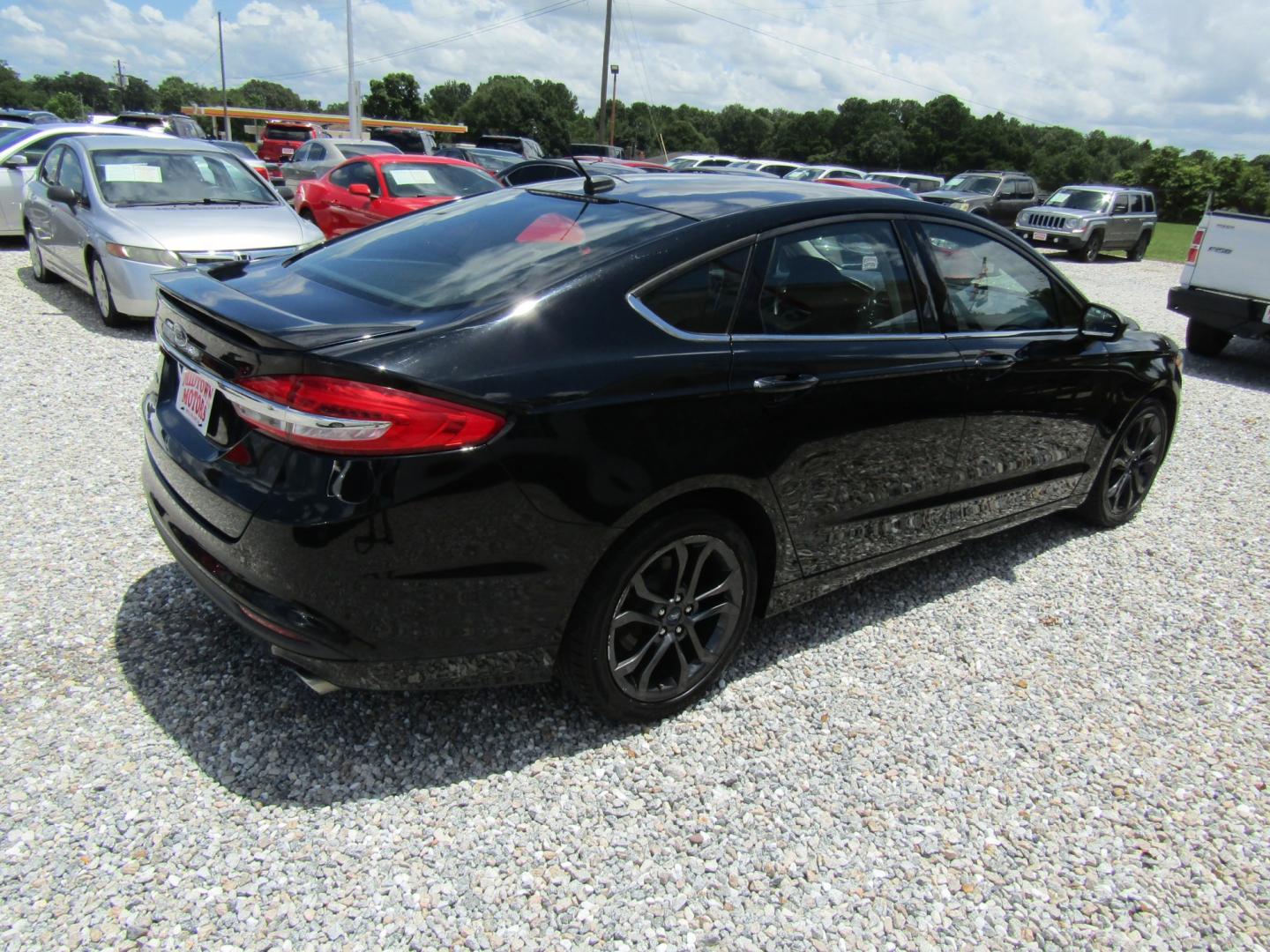2018 Black Ford Fusion S (3FA6P0G70JR) with an 2.5L L4 DOHC 16V engine, Automatic transmission, located at 15016 S Hwy 231, Midland City, AL, 36350, (334) 983-3001, 31.306210, -85.495277- Photo#7
