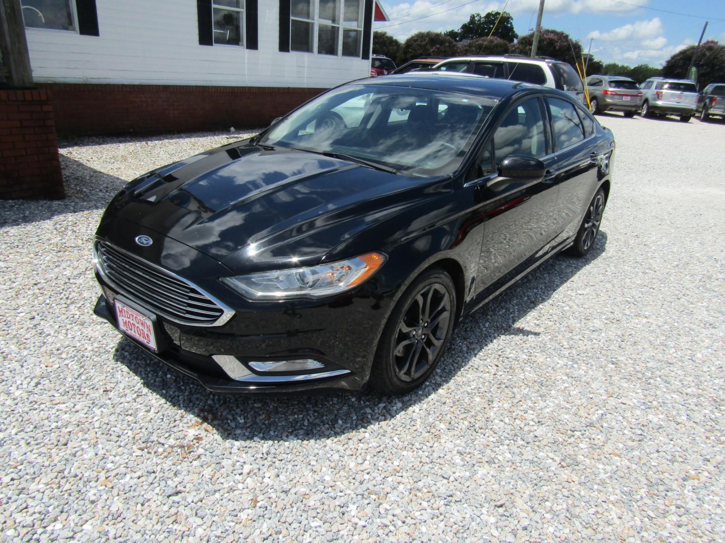 2018 Black Ford Fusion S (3FA6P0G70JR) with an 2.5L L4 DOHC 16V engine, Automatic transmission, located at 15016 S Hwy 231, Midland City, AL, 36350, (334) 983-3001, 31.306210, -85.495277- Photo#2