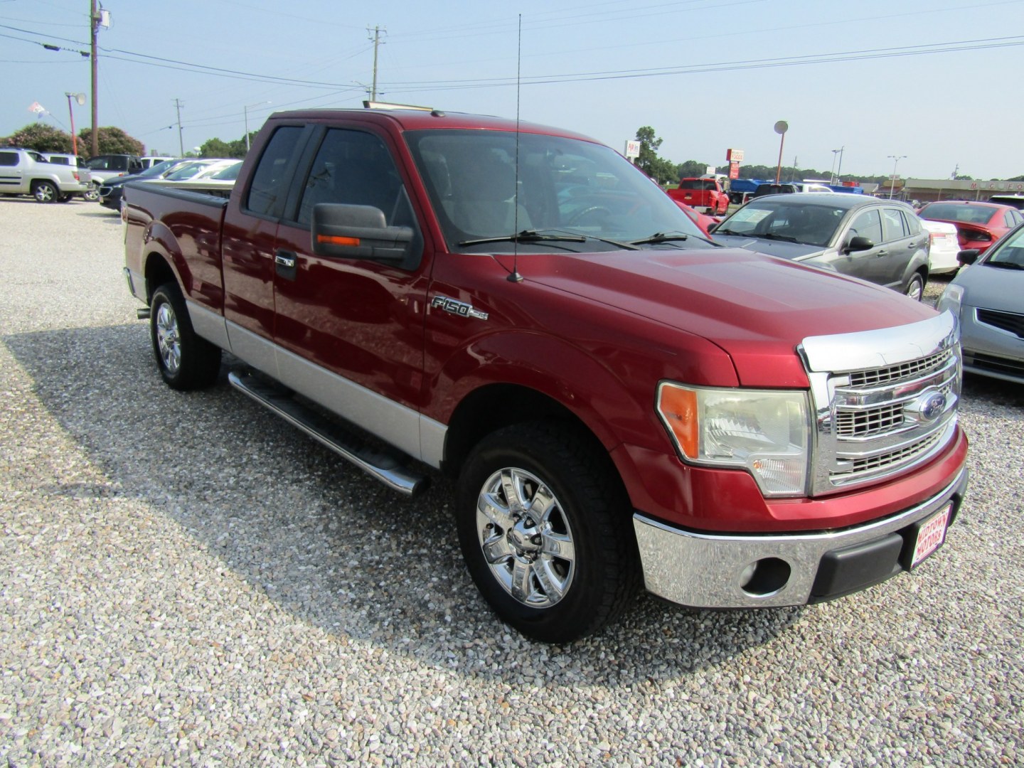 2014 Red Ford F-150 XLT SuperCab 8-ft. Bed 2WD (1FTEX1CM0EF) with an 3.7L V6 DOHC 24V engine, Automatic transmission, located at 15016 S Hwy 231, Midland City, AL, 36350, (334) 983-3001, 31.306210, -85.495277- Photo#0