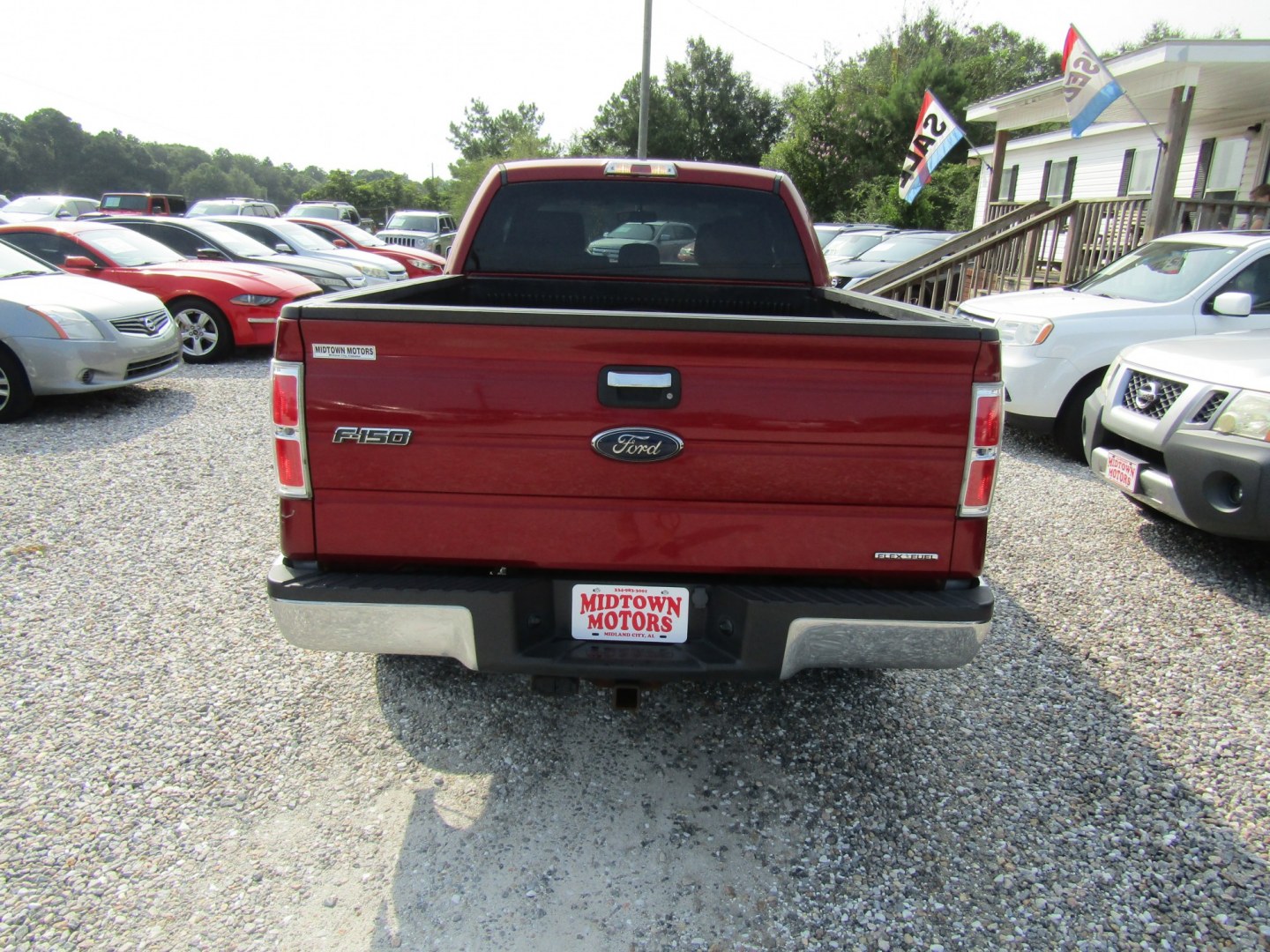 2014 Red Ford F-150 XLT SuperCab 8-ft. Bed 2WD (1FTEX1CM0EF) with an 3.7L V6 DOHC 24V engine, Automatic transmission, located at 15016 S Hwy 231, Midland City, AL, 36350, (334) 983-3001, 31.306210, -85.495277- Photo#5