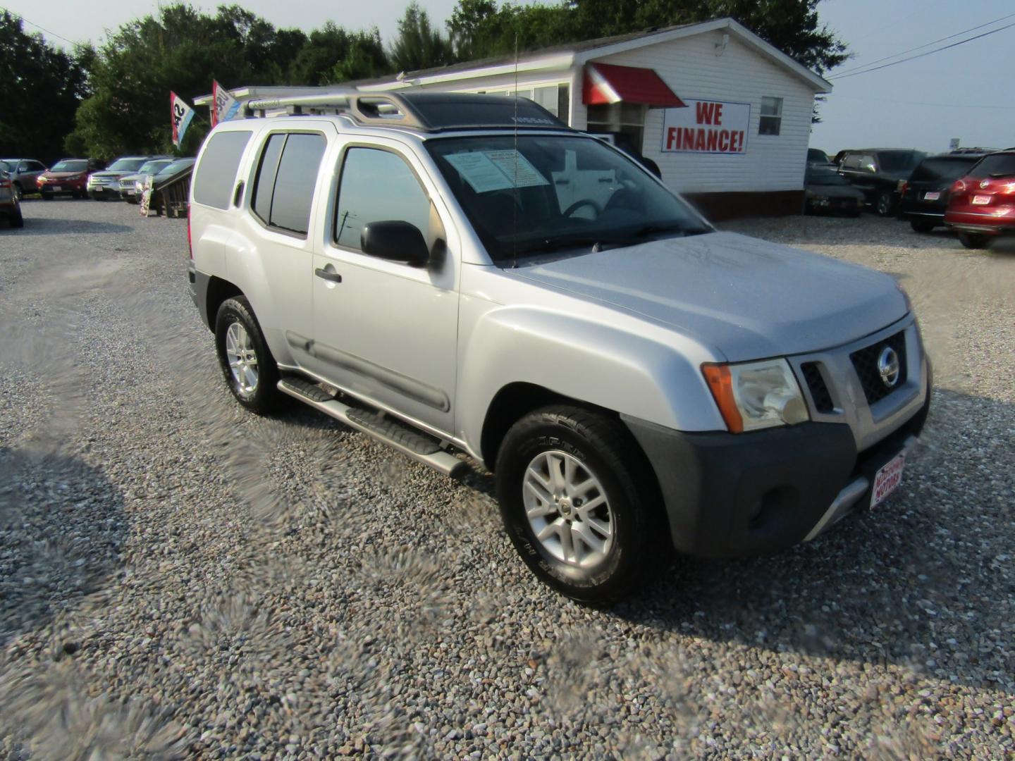 2014 Silver Nissan Xterra S 2WD (5N1AN0NU9EN) with an 4.0L V6 DOHC 24V engine, Automatic transmission, located at 15016 S Hwy 231, Midland City, AL, 36350, (334) 983-3001, 31.306210, -85.495277- Photo#0