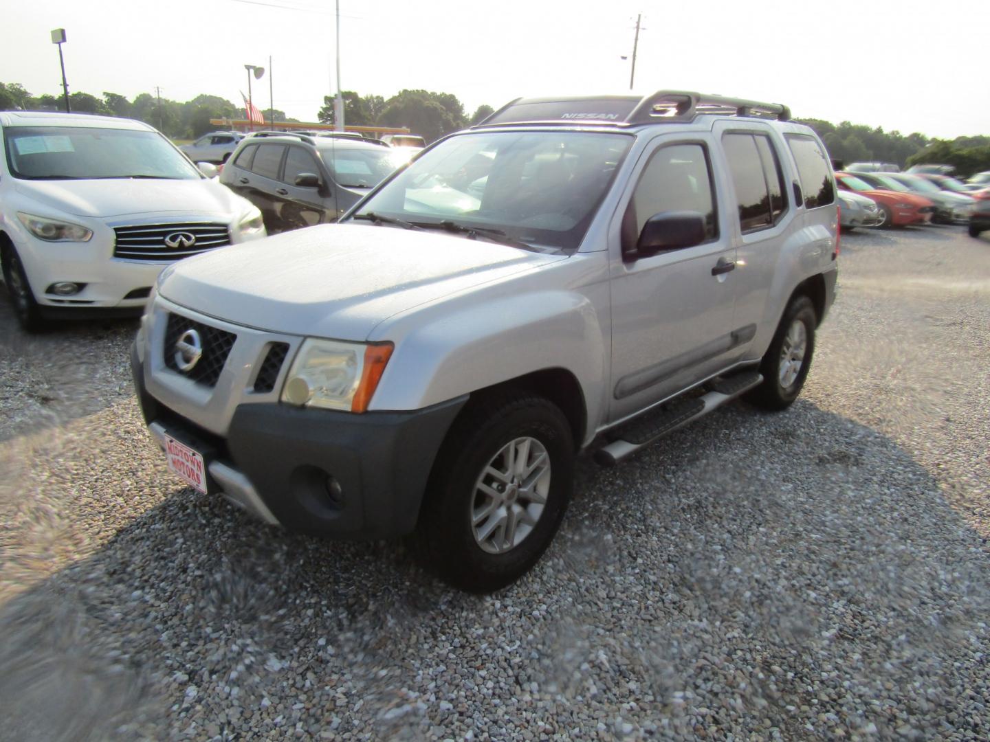 2014 Silver Nissan Xterra S 2WD (5N1AN0NU9EN) with an 4.0L V6 DOHC 24V engine, Automatic transmission, located at 15016 S Hwy 231, Midland City, AL, 36350, (334) 983-3001, 31.306210, -85.495277- Photo#2