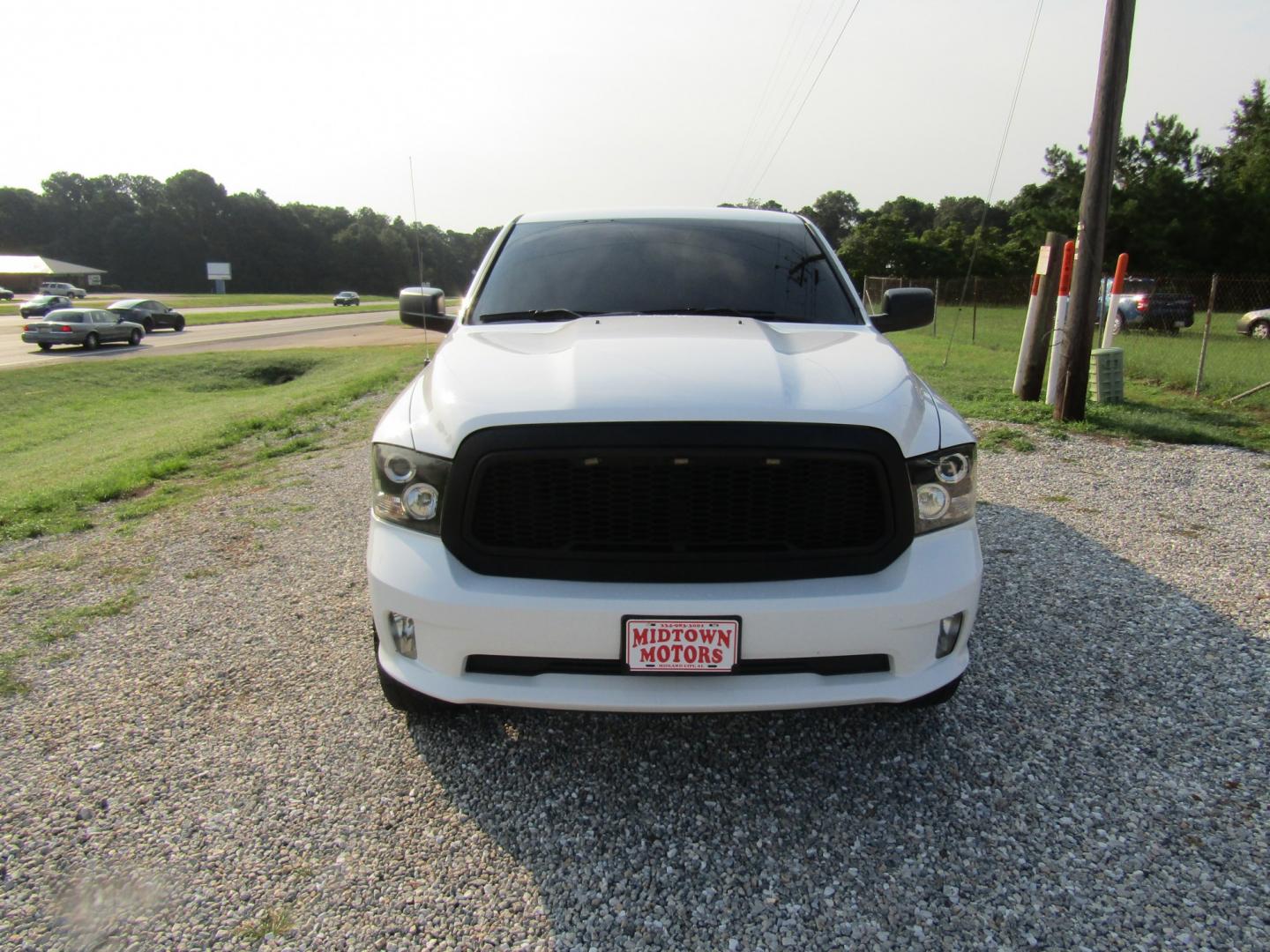 2018 White RAM 1500 Tradesman Quad Cab 4WD (1C6RR7FT2JS) with an 5.7L V8 OHV 16V engine, Automatic transmission, located at 15016 S Hwy 231, Midland City, AL, 36350, (334) 983-3001, 31.306210, -85.495277- Photo#1
