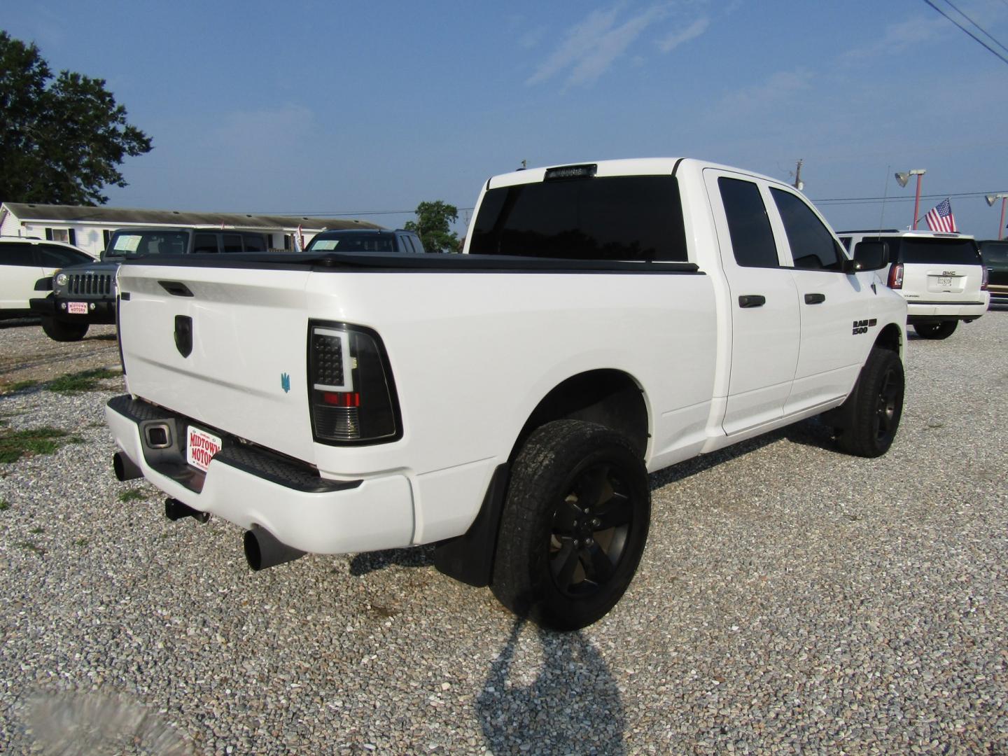 2018 White RAM 1500 Tradesman Quad Cab 4WD (1C6RR7FT2JS) with an 5.7L V8 OHV 16V engine, Automatic transmission, located at 15016 S Hwy 231, Midland City, AL, 36350, (334) 983-3001, 31.306210, -85.495277- Photo#7