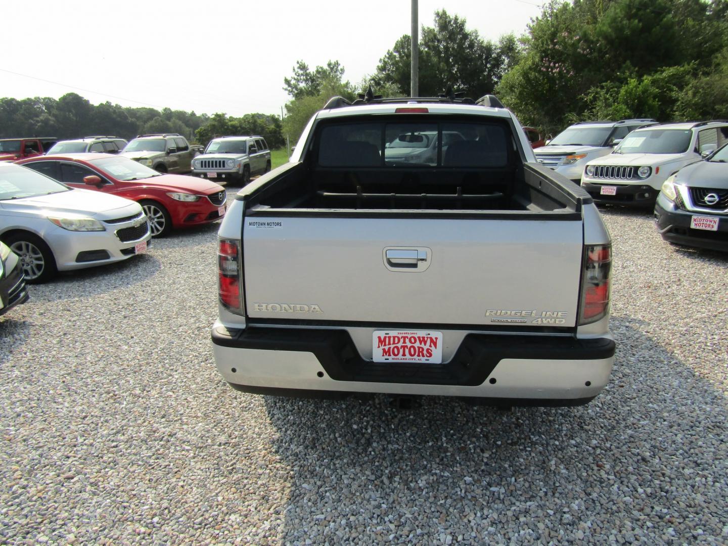2014 Silver Honda Ridgeline RTL-S (5FPYK1F6XEB) with an 3.5L V6 SOHC 24V engine, Automatic transmission, located at 15016 S Hwy 231, Midland City, AL, 36350, (334) 983-3001, 31.306210, -85.495277- Photo#6