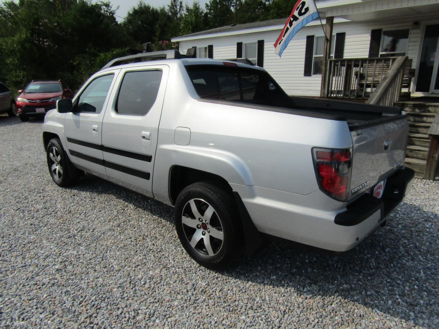 2014 Silver Honda Ridgeline RTL-S (5FPYK1F6XEB) with an 3.5L V6 SOHC 24V engine, Automatic transmission, located at 15016 S Hwy 231, Midland City, AL, 36350, (334) 983-3001, 31.306210, -85.495277- Photo#5