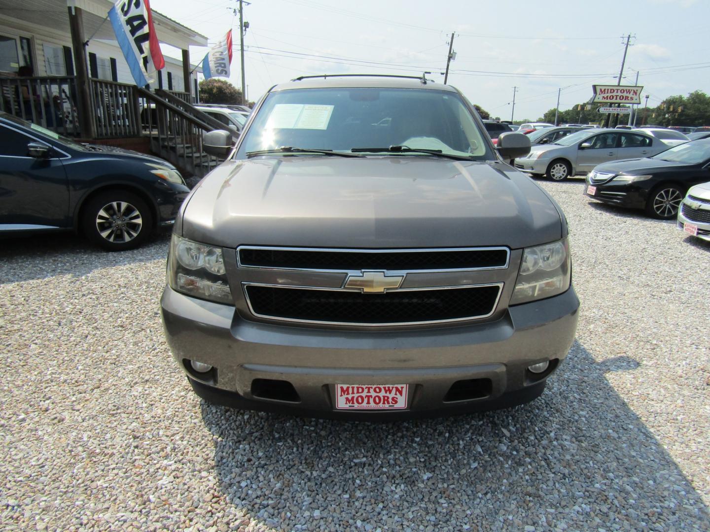 2011 Brown Chevrolet Tahoe LT 2WD (1GNSCBE07BR) with an 5.3L V8 OHV 16V FFV engine, Automatic transmission, located at 15016 S Hwy 231, Midland City, AL, 36350, (334) 983-3001, 31.306210, -85.495277- Photo#1