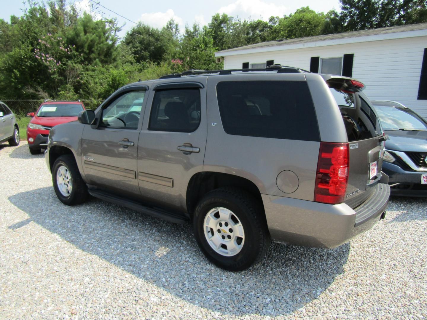 2011 Brown Chevrolet Tahoe LT 2WD (1GNSCBE07BR) with an 5.3L V8 OHV 16V FFV engine, Automatic transmission, located at 15016 S Hwy 231, Midland City, AL, 36350, (334) 983-3001, 31.306210, -85.495277- Photo#5