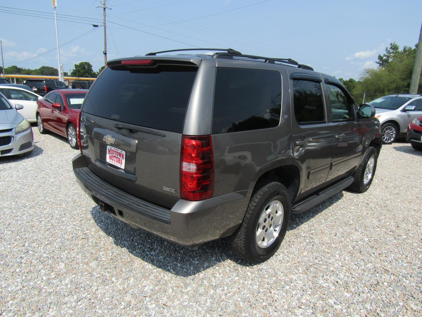 2011 Brown Chevrolet Tahoe LT 2WD (1GNSCBE07BR) with an 5.3L V8 OHV 16V FFV engine, Automatic transmission, located at 15016 S Hwy 231, Midland City, AL, 36350, (334) 983-3001, 31.306210, -85.495277- Photo#7