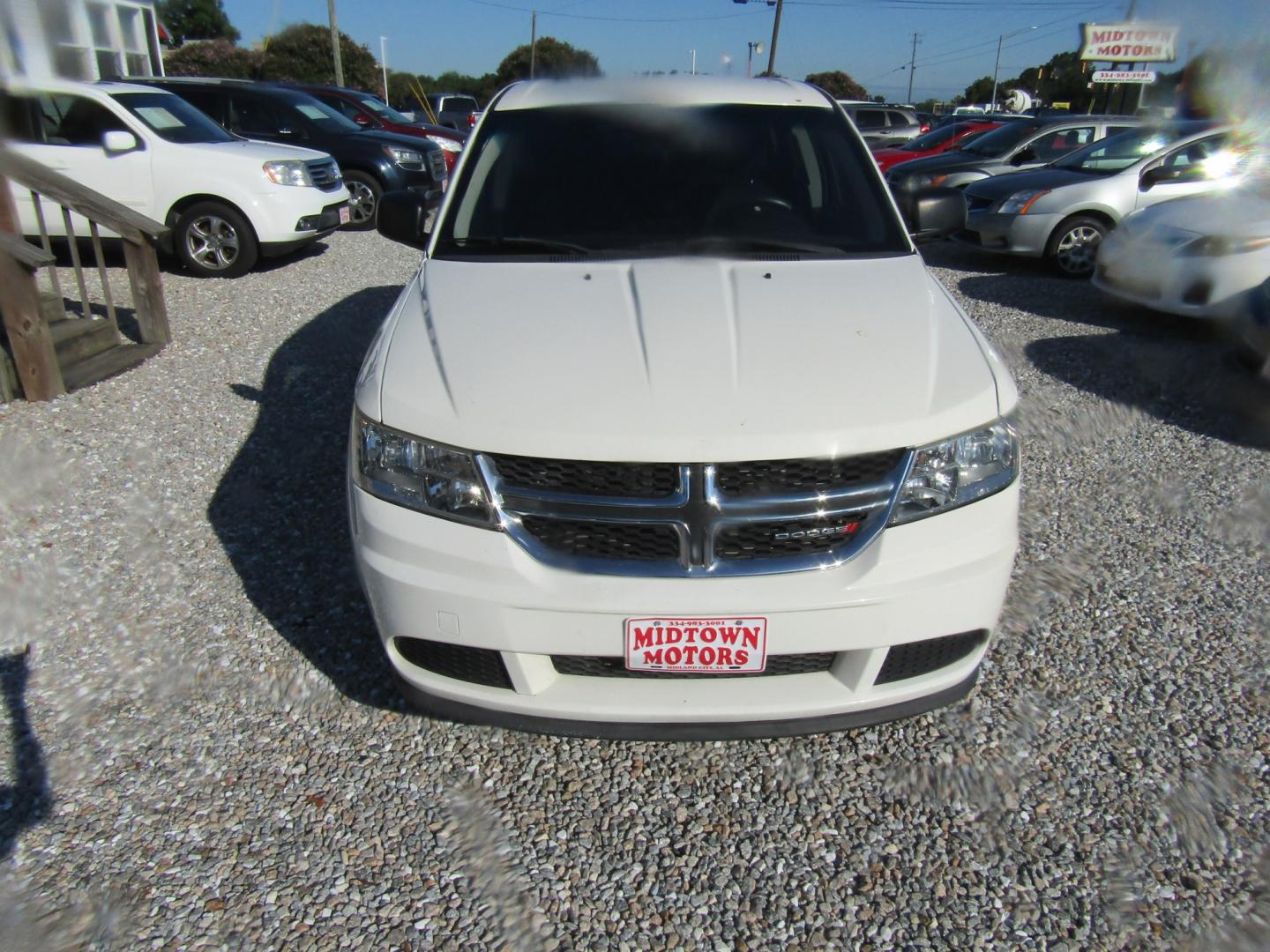 2013 White Dodge Journey SE (3C4PDCAB2DT) with an 2.4L L4 DOHC 16V engine, Automatic transmission, located at 15016 S Hwy 231, Midland City, AL, 36350, (334) 983-3001, 31.306210, -85.495277- Photo#0